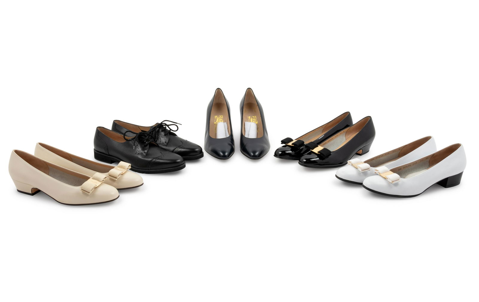 Nine Pairs of Salvatore Ferragamo Shoes, 1990-2010s: Nine Pairs of Salvatore Ferragamo Shoes, 1990-2010s This lot includes nine pairs of shoes in boxes.† † THE FIRST Black leather slip on mid-heel pumps with pointed-toe silhouette, and leath