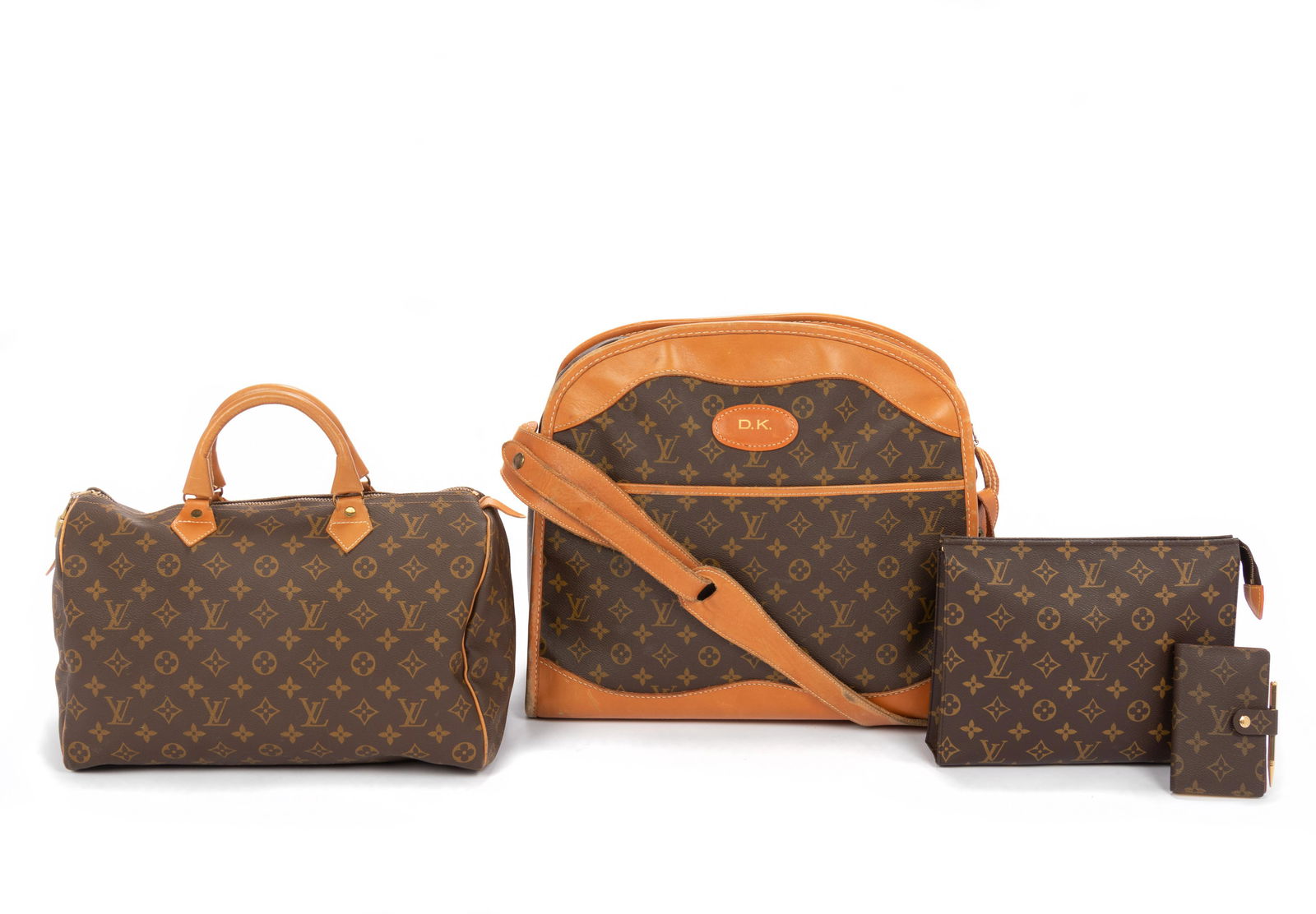 Four Vintage Louis Vuitton Bags, 1970-1980s: Four Vintage Louis Vuitton Bags, 1970-1980s This lot includes four bags.† THE FIRST Brown and tan LV monogram coated canvas pocket notebook with single snap closure, two slide pockets with spira