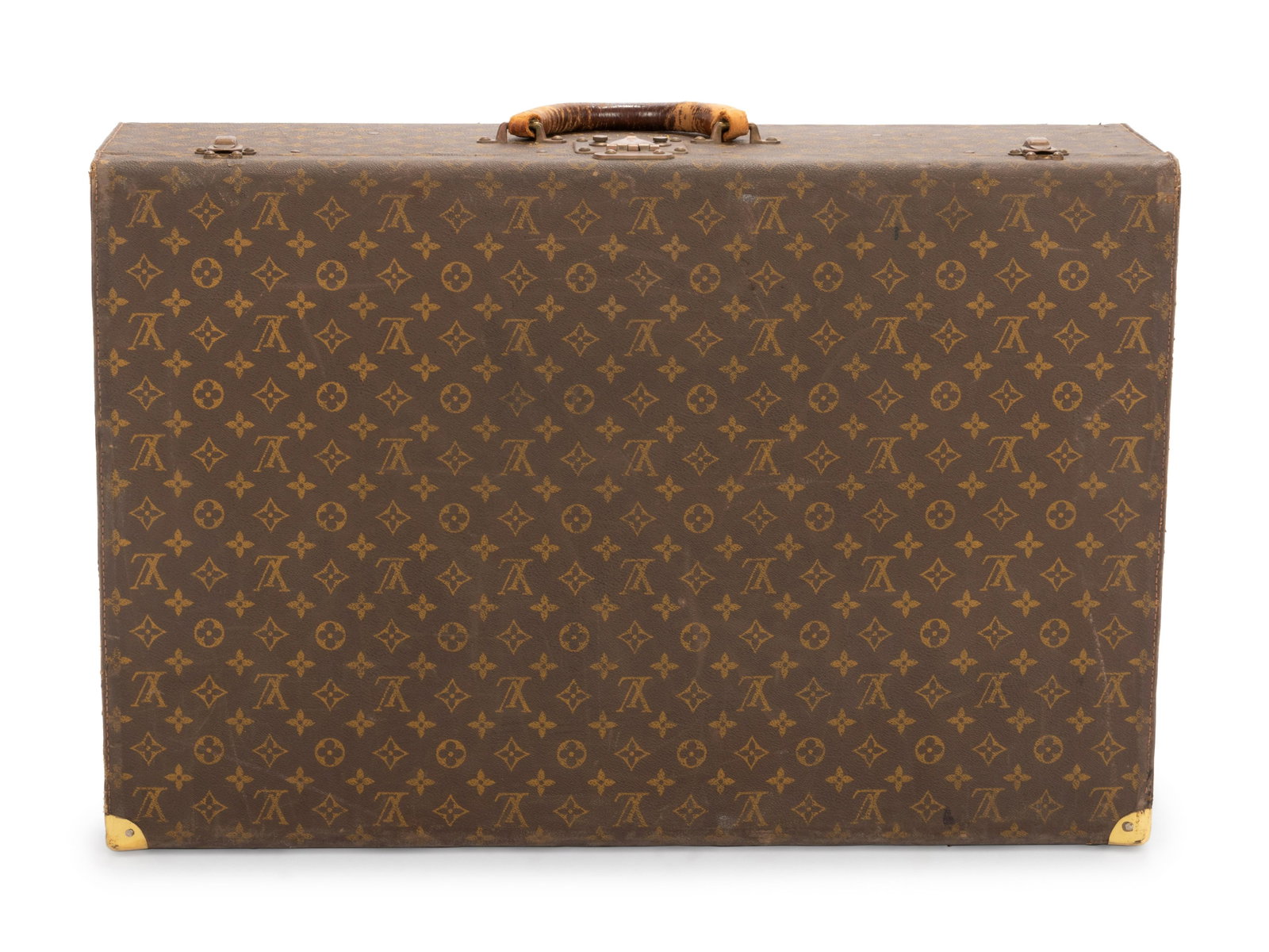 Louis Vuitton Hard Shell Suitcase, 1970-1980s: Louis Vuitton Hard Shell Suitcase, 1970-1980s Brown and tan LV monogram coated canvas hard shell suitcase with leather handle, gold-tone corner hardware, top side pressure clasp and latch clasp closur