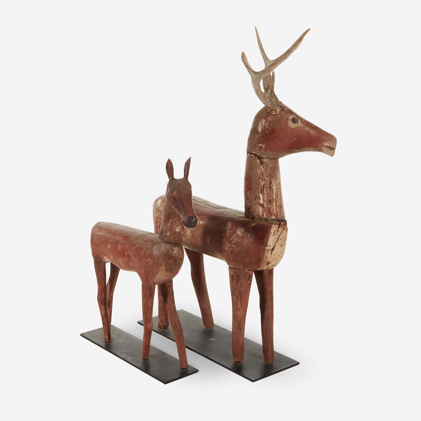Carved and painted wood figures of a deer and faun, (1 of 2)