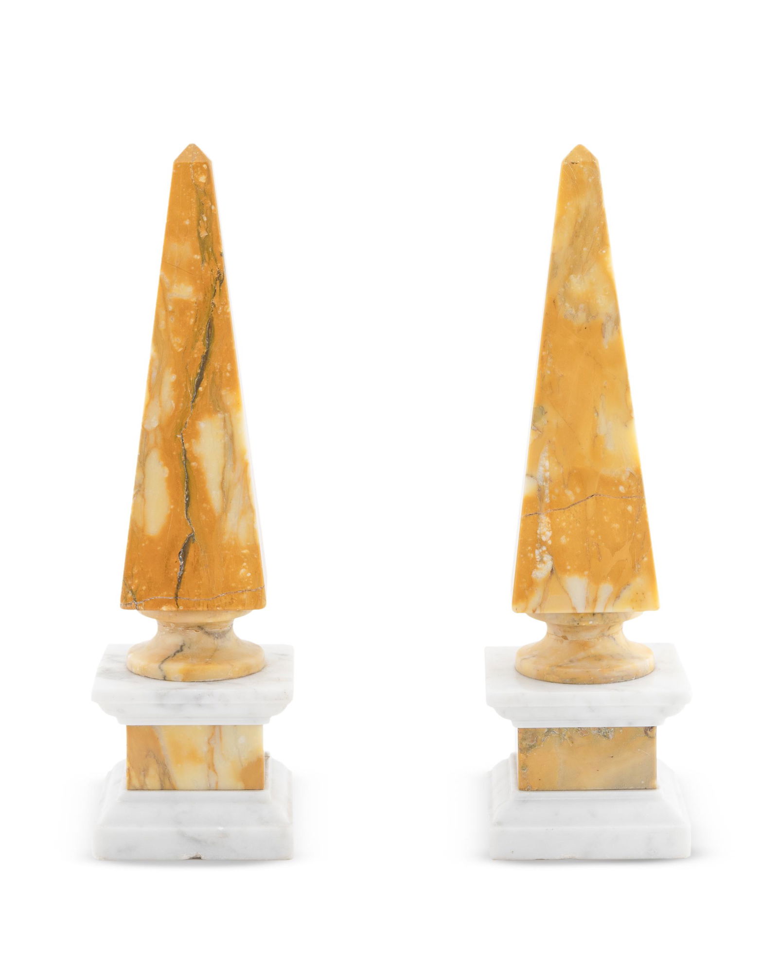 A Pair of Italian Sienna Marble Obelisks Height 12: A Pair of Italian Sienna Marble Obelisks 20TH CENTURY Height 12 inches. Property from the Estate of Rawleigh & Mary Ann Warner, Hobe Sound, Florida