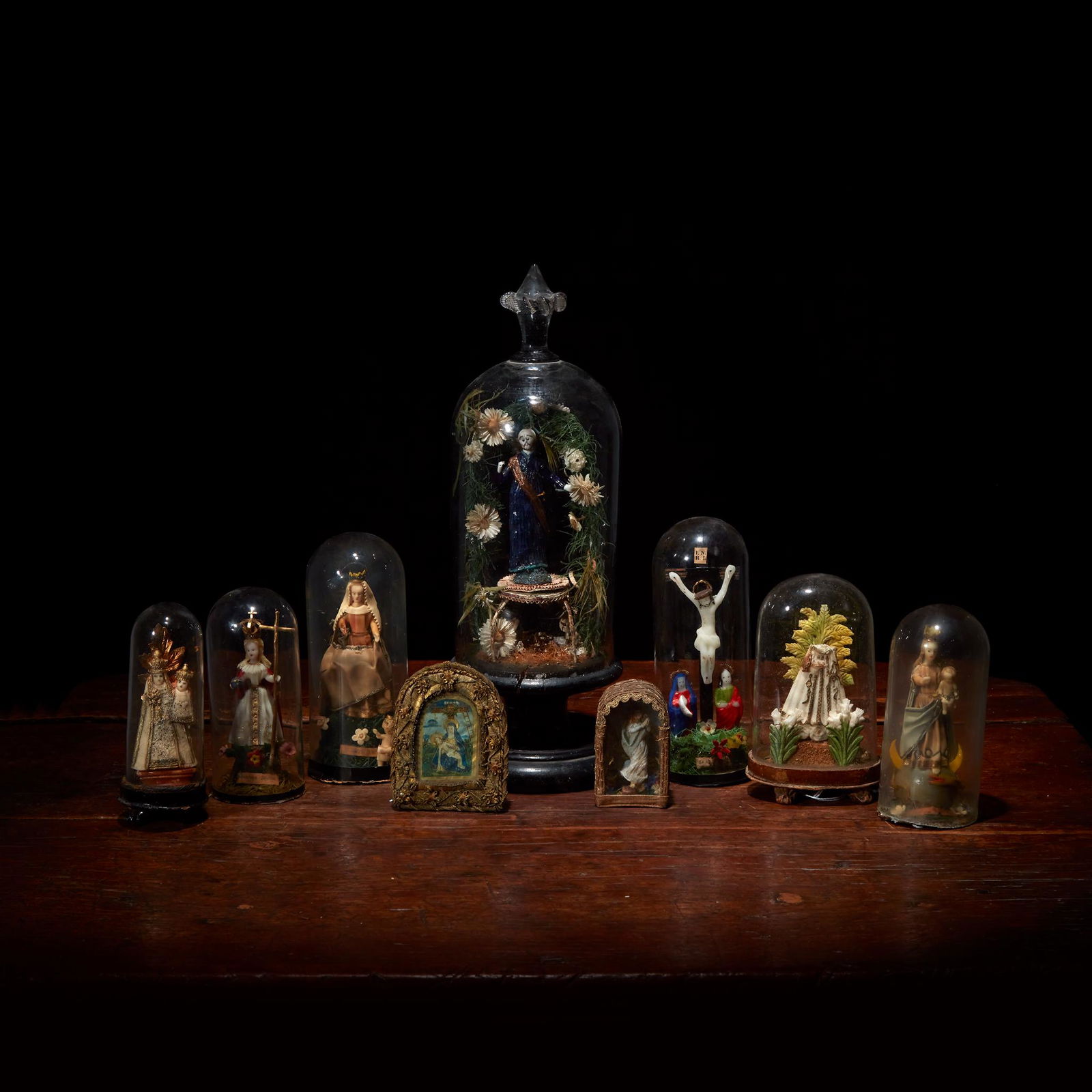 A collection of German blown glass and wax saints, Most (1 of 5)