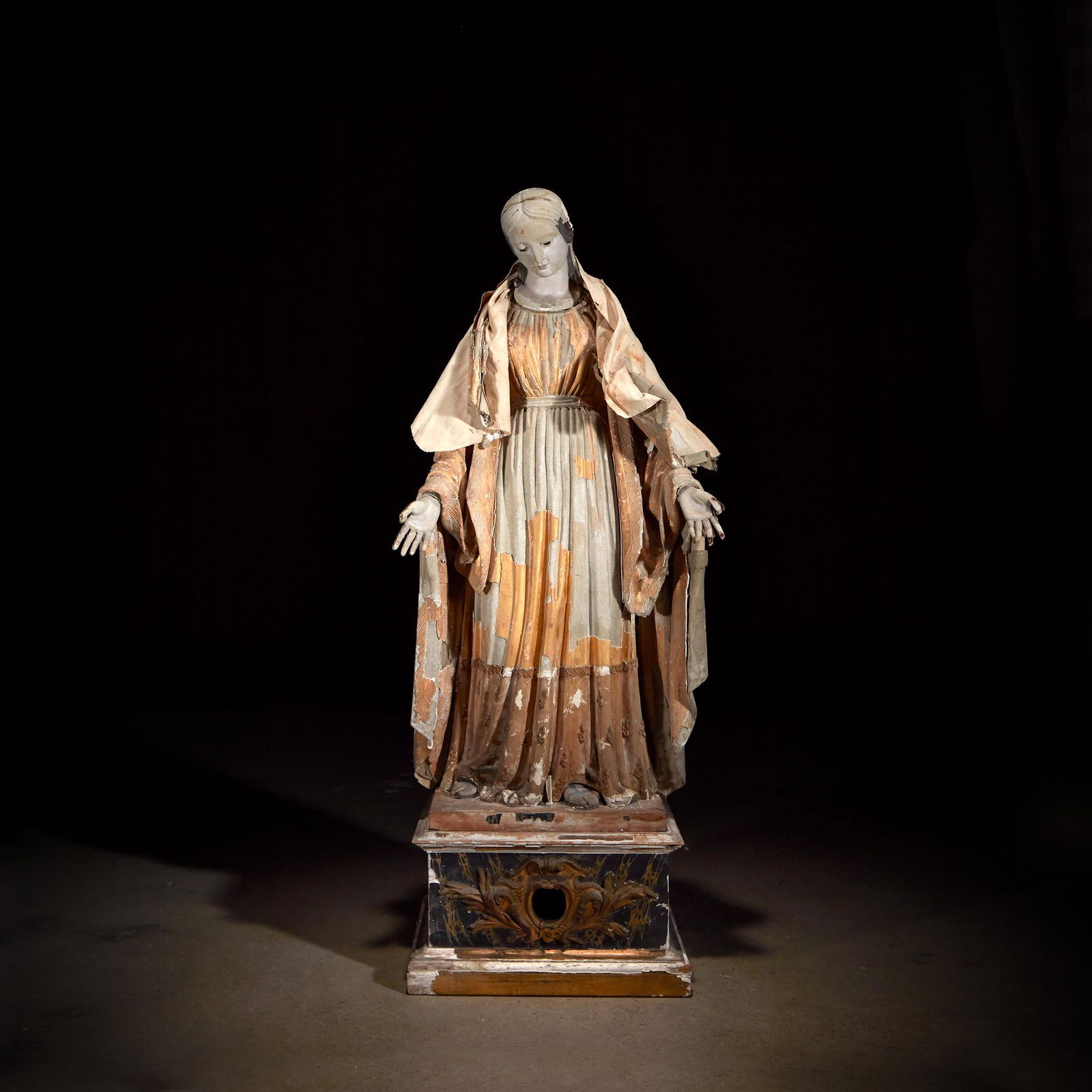 A large Mexican figural reliquary of the Madonna of the (1 of 2)