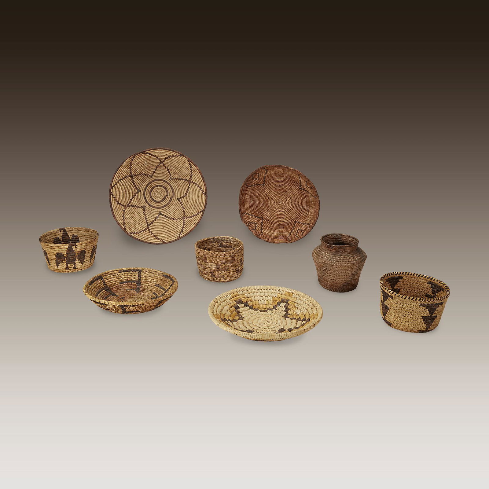 A group of eight small American Indian woven baskets (1 of 1)