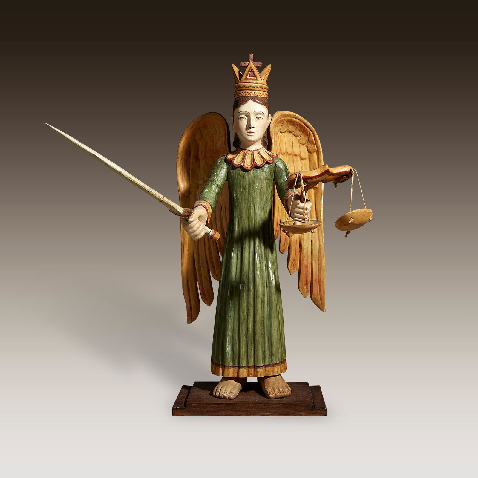 A carved and painted Santos of Archangel Michael, Felix (1 of 2)