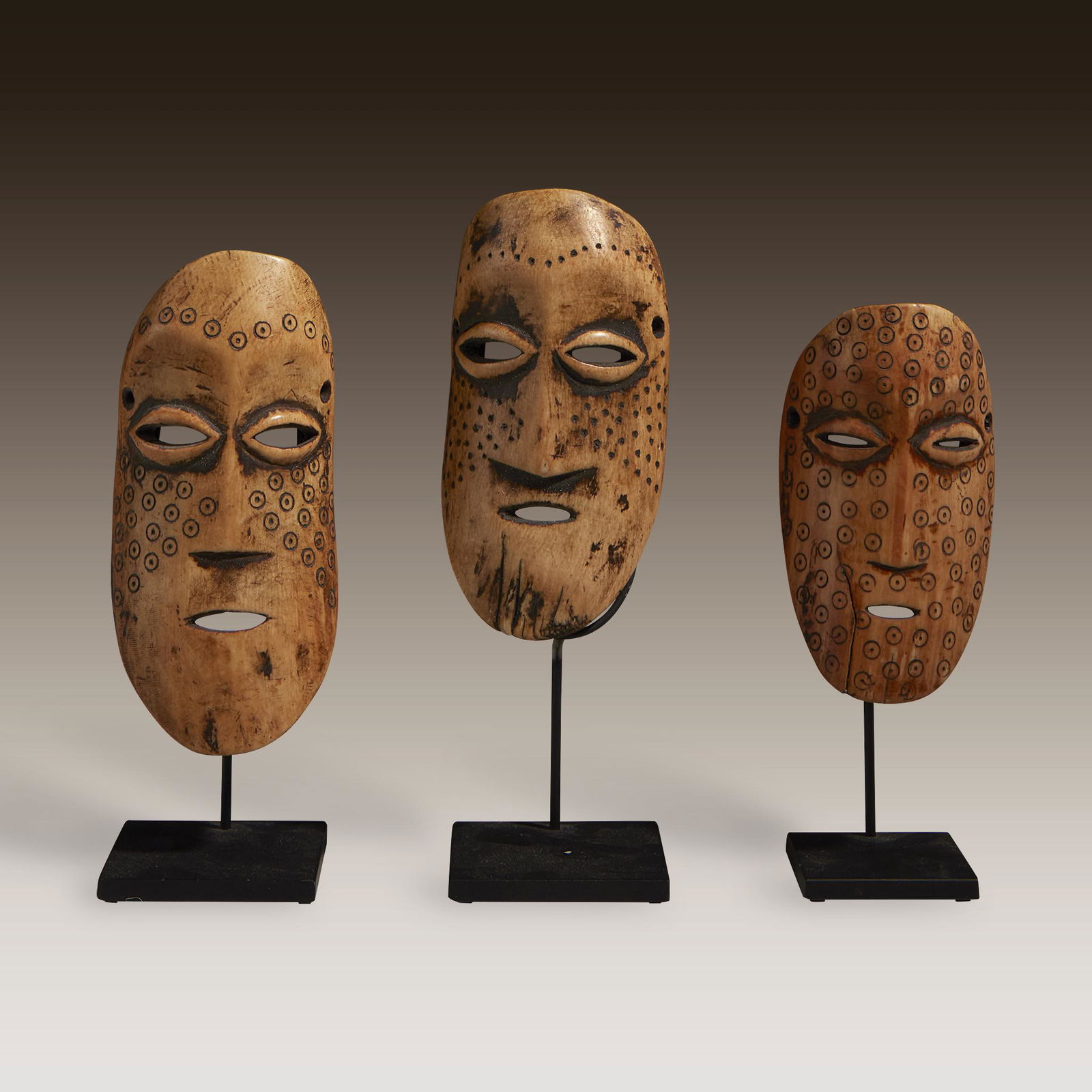 A trio of Lega masks, Democratic Republic of Congo (1 of 2)