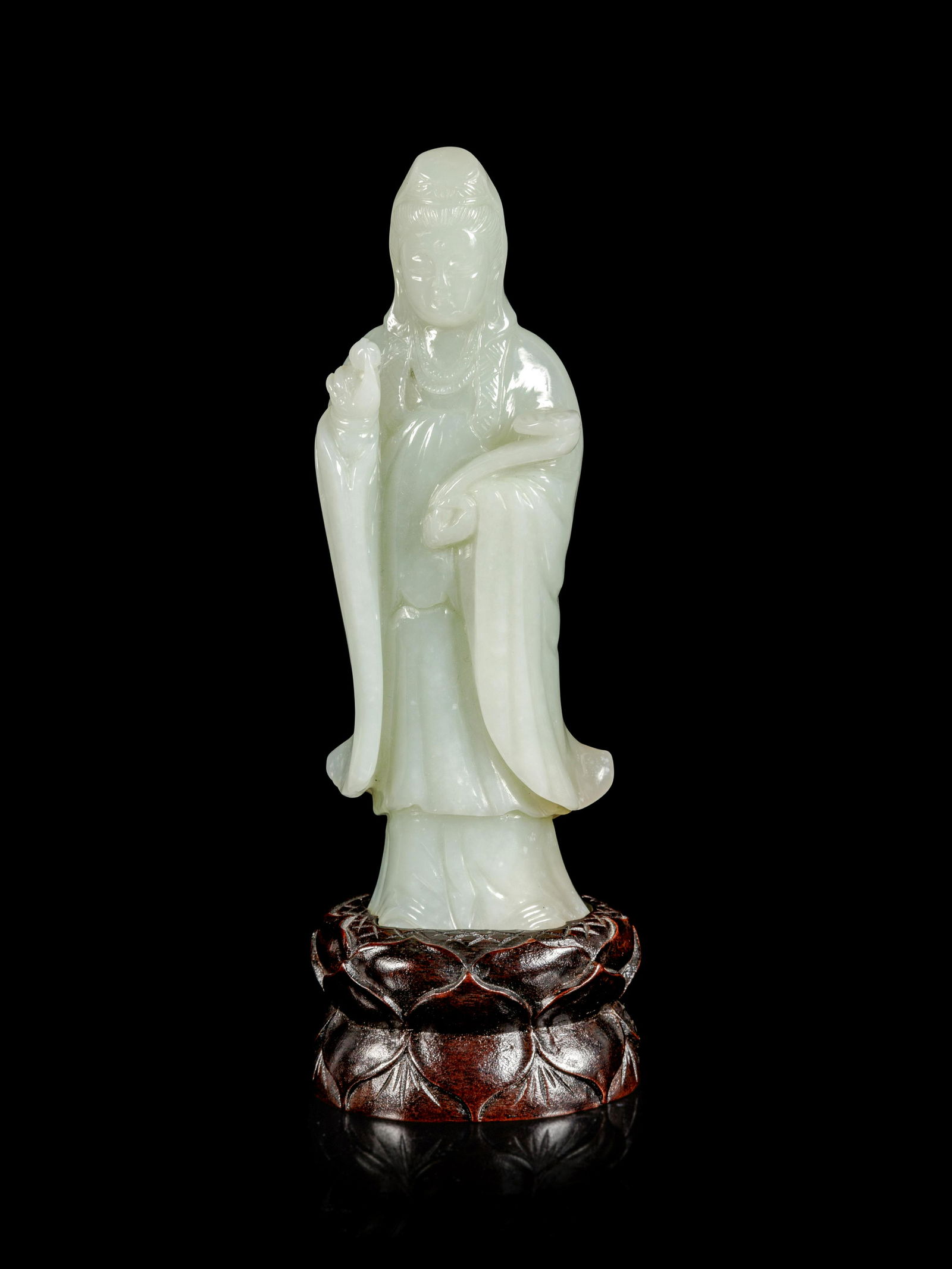 A Pale Celadon Jade Figure of Guanyin (1 of 3)