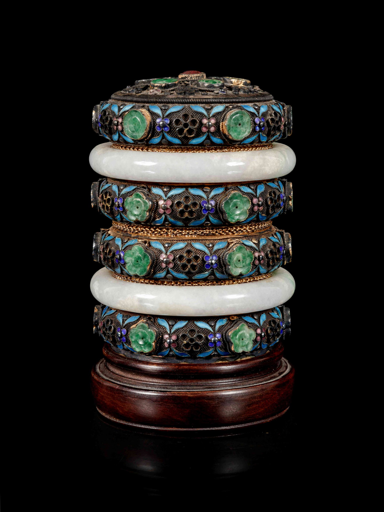 A Jadeite and Hardstone Inset Enameled Jewelry Box and: A Jadeite and Hardstone Inset Enameled Jewelry Box and Cover 近代 燒藍嵌寶鑲玉首飾盒 of cylindrical form with reticulated 'prunus' mot