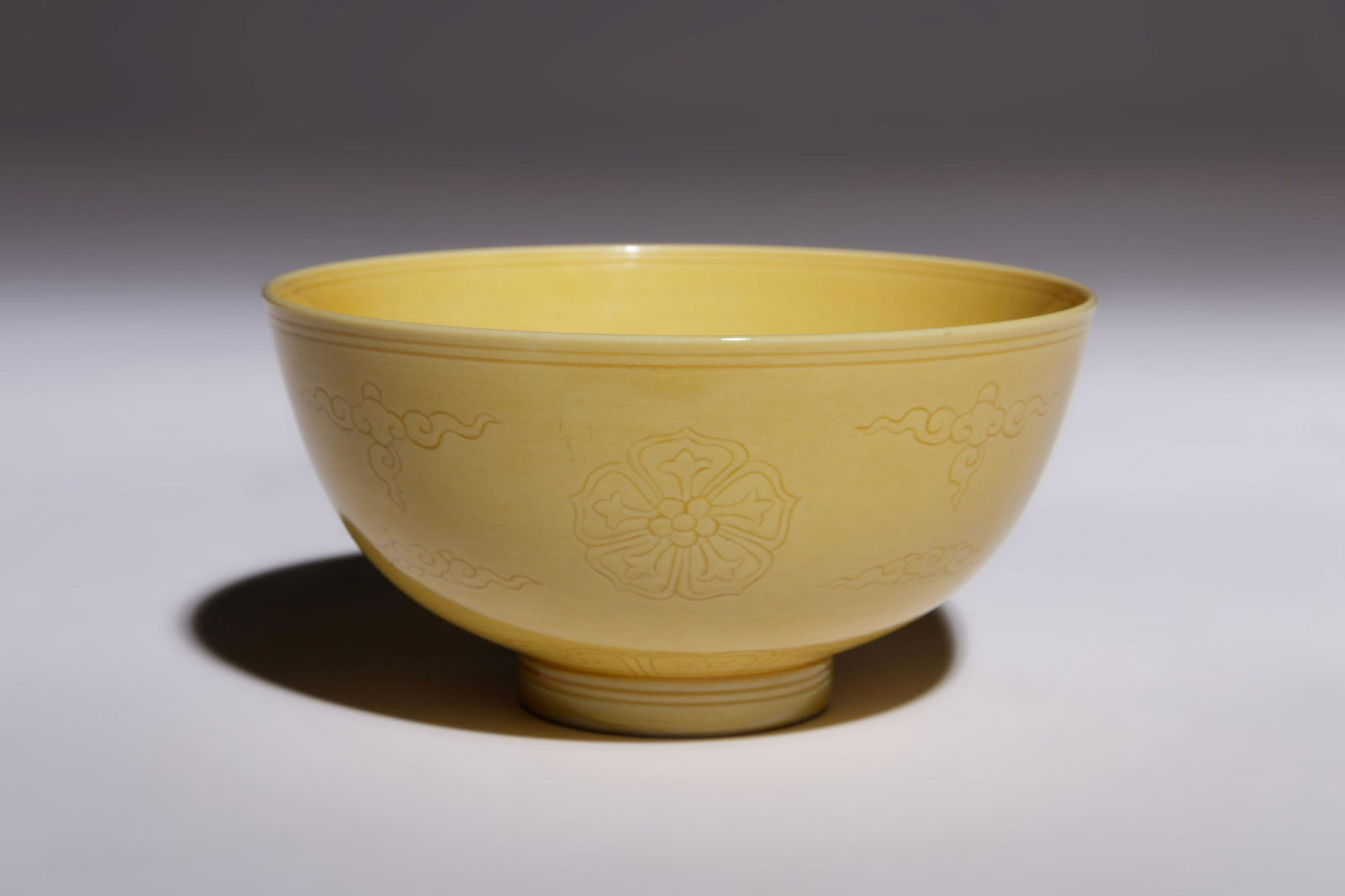 An Incised Yellow Glazed Porcelain Bowl (1 of 2)
