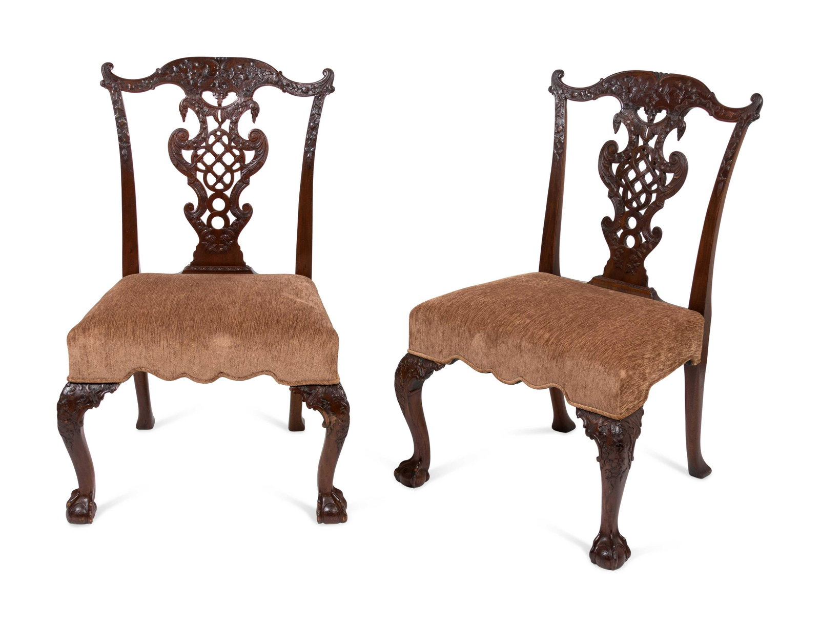 A Set of Ten George III Style Mahogany Dining Chairs in: A Set of Ten George III Style Mahogany Dining Chairs in the Chippendale Taste 19th Century two armchairs and eight side chairs. Height 39 x width 25 x depth 23 inches. Property from the Historic Sword