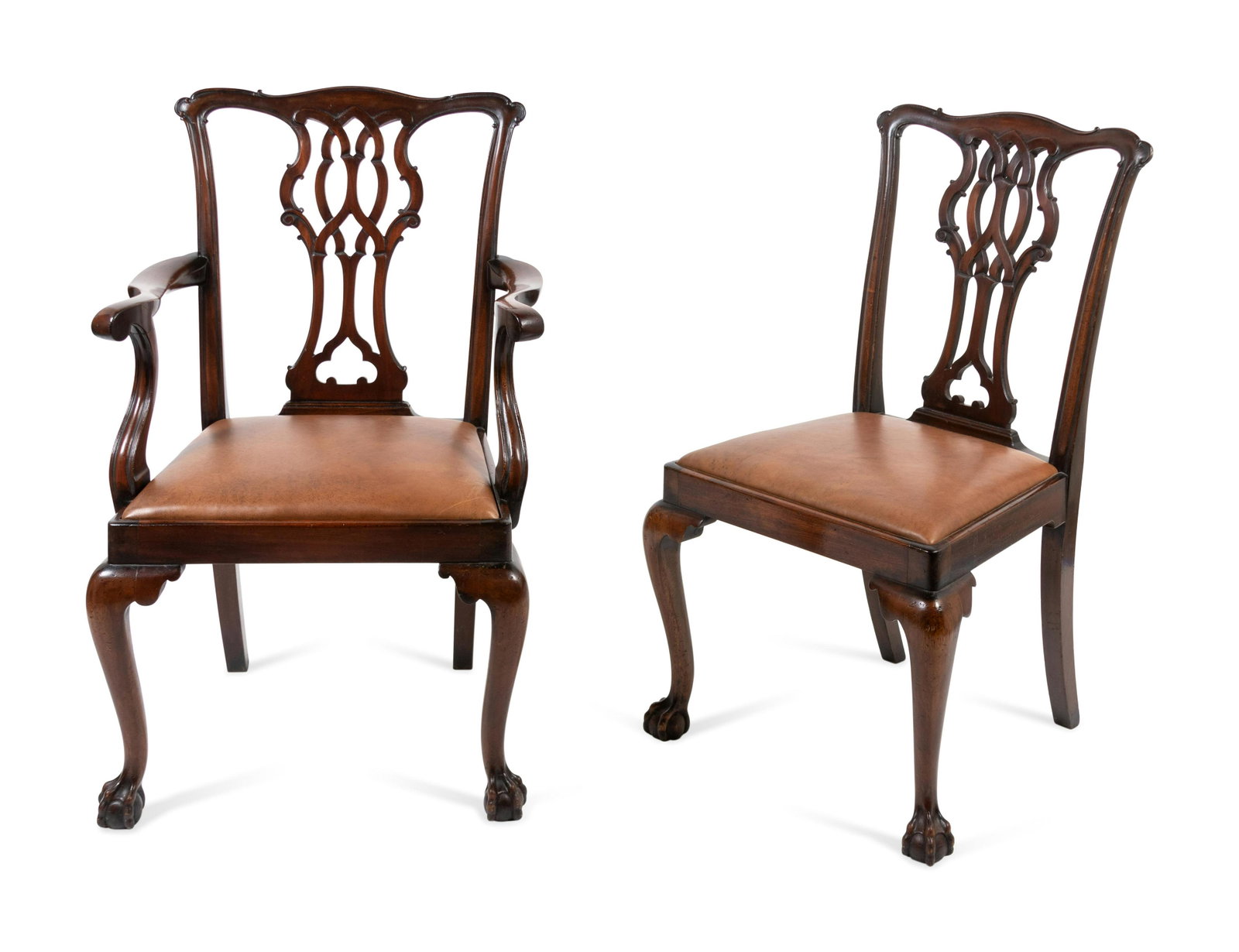 Two George III Style Carved Mahogany Chairs Height of: Two George III Style Carved Mahogany Chairs 19th Century Height of armchair 39 x width 21 1/2 x depth 21 inches. Property from the Historic Sword Gate House, Charleston, South Carolina