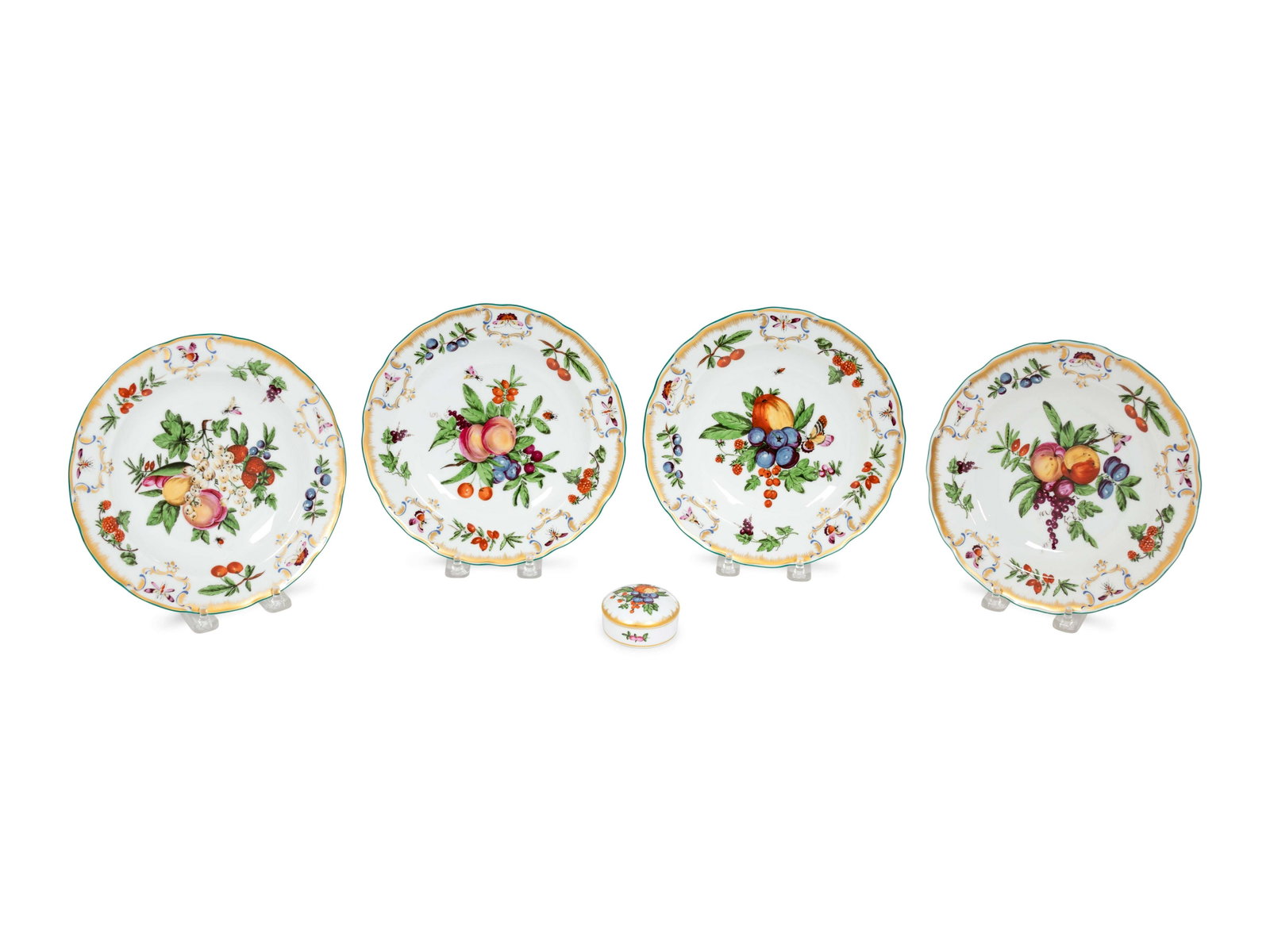 A Set of Twelve Mottahedeh Porcelain Plates Diameter 8: A Set of Twelve Mottahedeh Porcelain Plates together with a salt cellar. Diameter 8 1/4 inches. Property from the Estate of Sally Gatling Tomlinson, Atlanta, Georgia