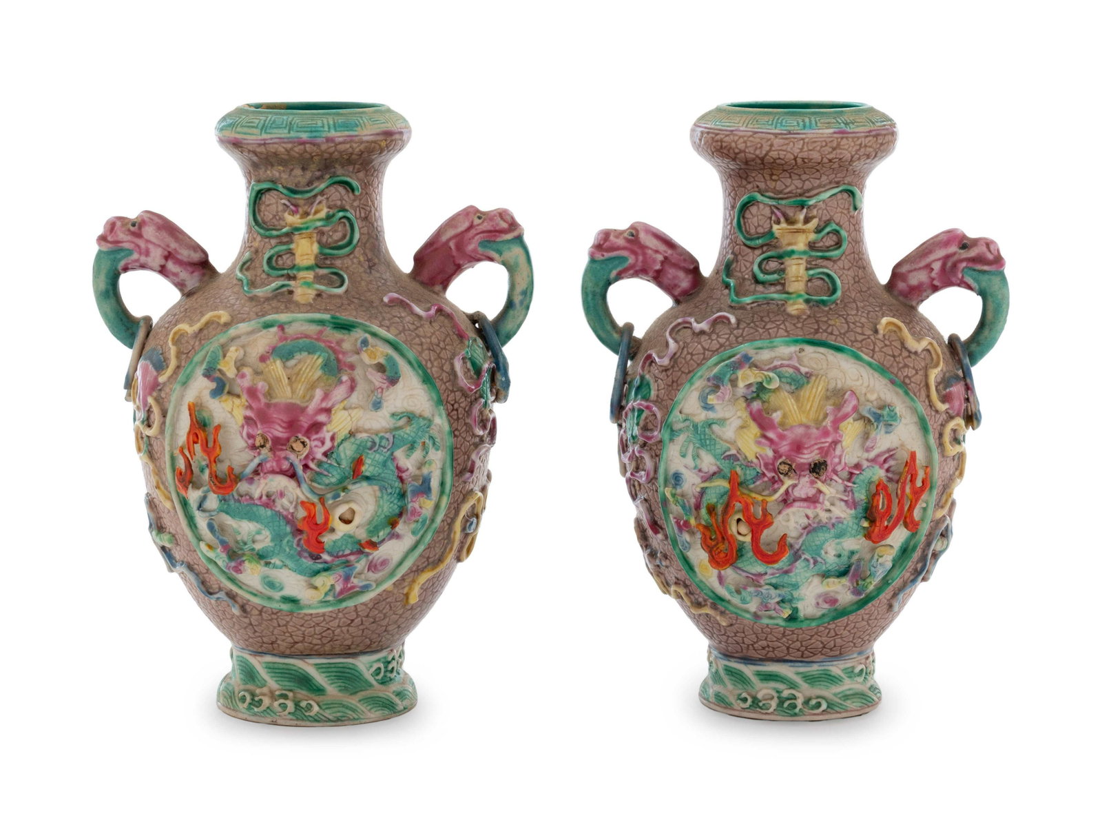 A Pair of Chinese Famille Rose Porcelain 'Dragon' Vases: A Pair of Chinese Famille Rose Porcelain 'Dragon' Vases each with high shoulders surmounted by molded handles, and fully decorated with carve and molded details. Height 5 in., 12.5 cm. Property from a