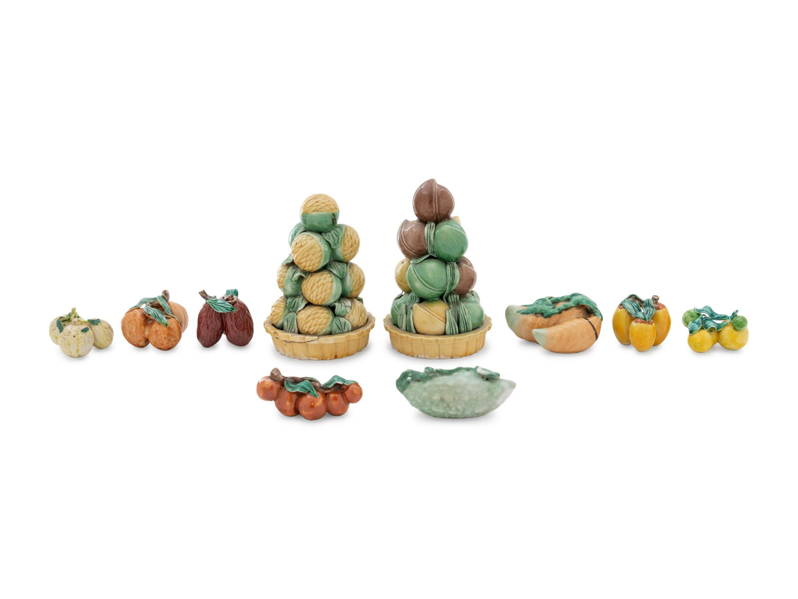 Ten Chinese Sancai Glazed Porcelain Model of Fruits: Ten Chinese Sancai Glazed Porcelain Model of Fruits in the form of peaches, lichees, dates, apples and persimmons. Height of tallest 5 3/4 in., 14.6 cm.