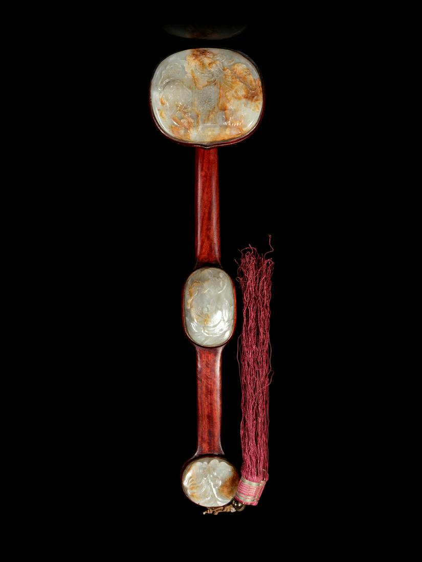 A Chinese Russet and Celadon Jade Inset Hardwood Ruyi (1 of 5)