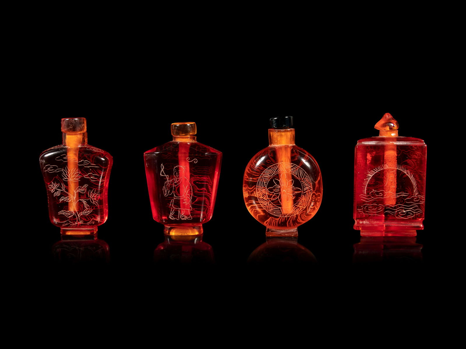 Four Chinese Amber Tone Glass Snuff Bottles (1 of 4)