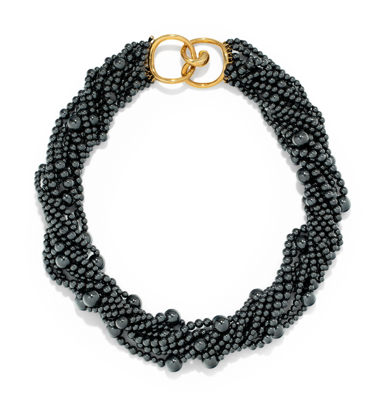 ANGELA CUMMINGS, HEMATITE TORSADE NECKLACE: ANGELA CUMMINGS, HEMATITE TORSADE NECKLACE Consisting of 10 strands of hematite beads measuring approximately 3.05-8.25 mm in diameter, with a yellow gold clasp. Stamp: 1984 CUMMINGS 18K. 112.55 dwt.