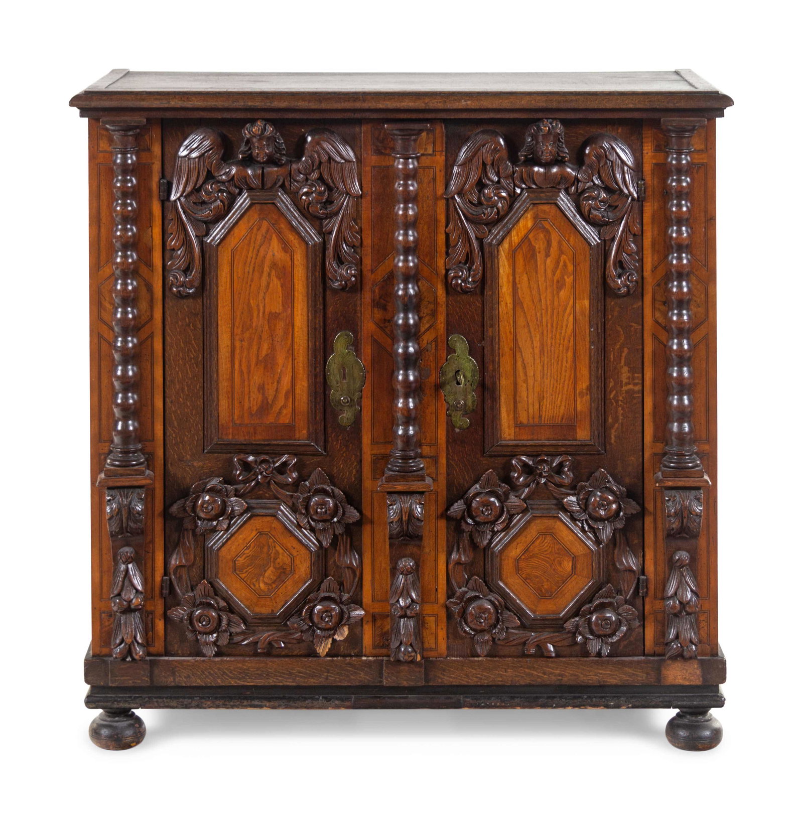 An Italian Baroque Carved Walnut and Oak Cabinet: An Italian Baroque Carved Walnut and Oak Cabinet 19th Century Height 43 3/4 x width 43 1/4 x depth 21 1/4 inches. 