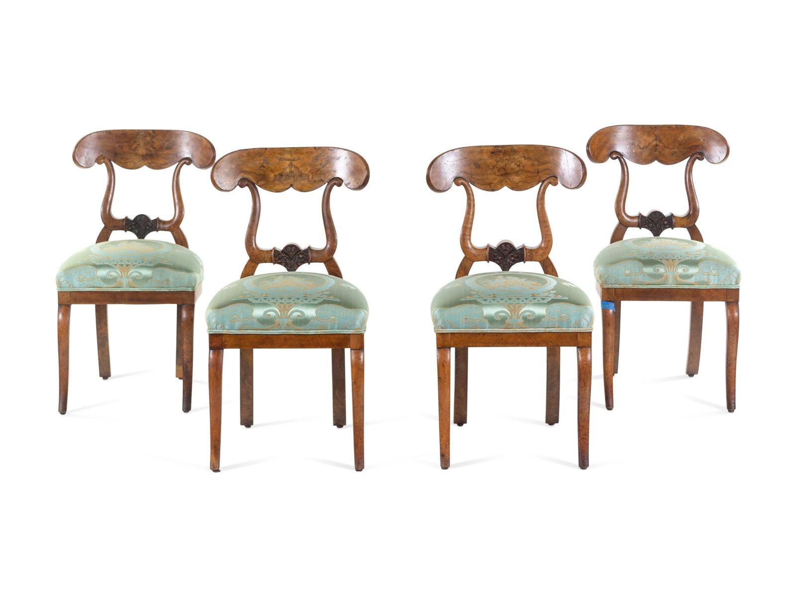 A Set of Four Biedermeier Foliate Carved Burl Walnut: A Set of Four Biedermeier Foliate Carved Burl Walnut Side Chairs 19th Century Height 34 inches.