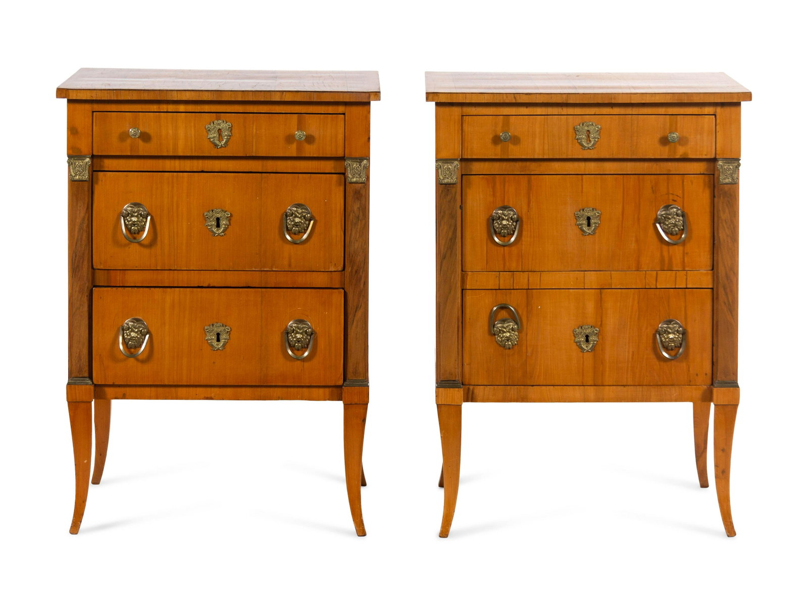 A Pair of Continental Bronze Mounted Birch Side Tables: A Pair of Continental Bronze Mounted Birch Side Tables Early 19th Century Height 32 3/8 x width 23 1/4 x depth 15 3/8 inches. Property from a Robert Metzger-designed interior, Maryland