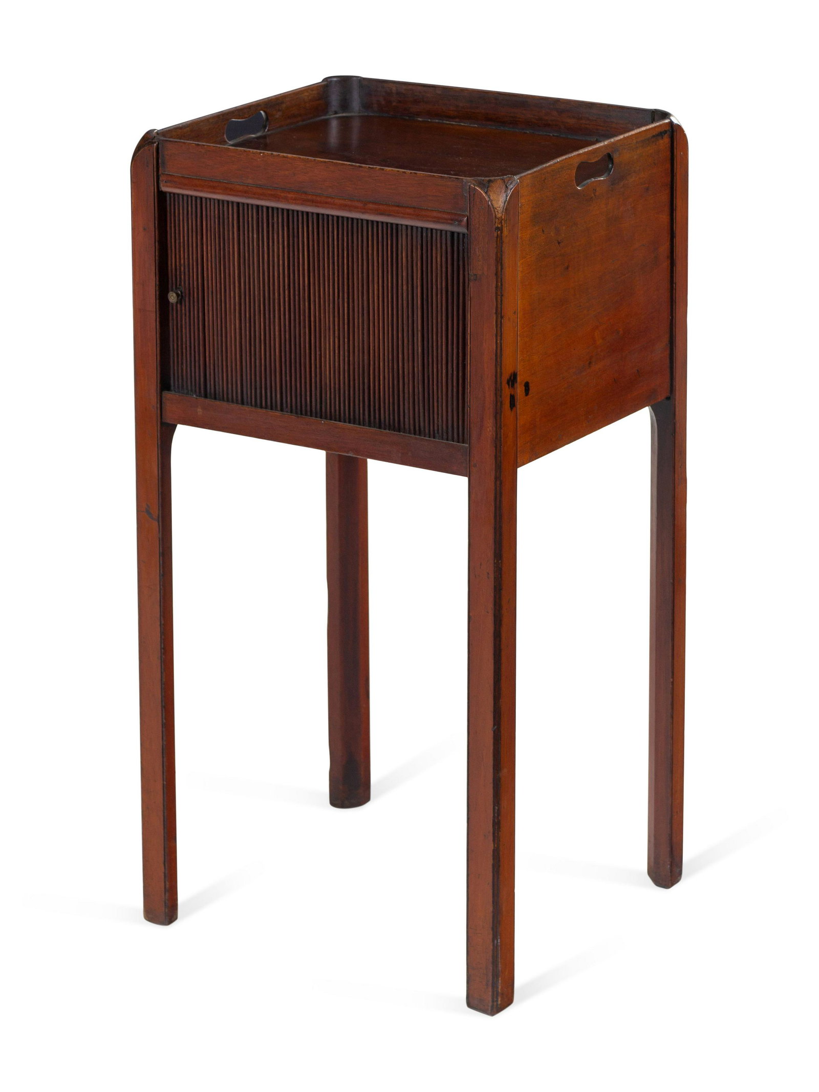 A Late George III Carved Mahogany Decanter Table: A Late George III Carved Mahogany Decanter Table Circa 1800 with a tambour door. Height 29 1/2 x width 16 x depth 14 inches. Property Sold to Benefit the Acquisition Fund of The San Diego Museum of Ar