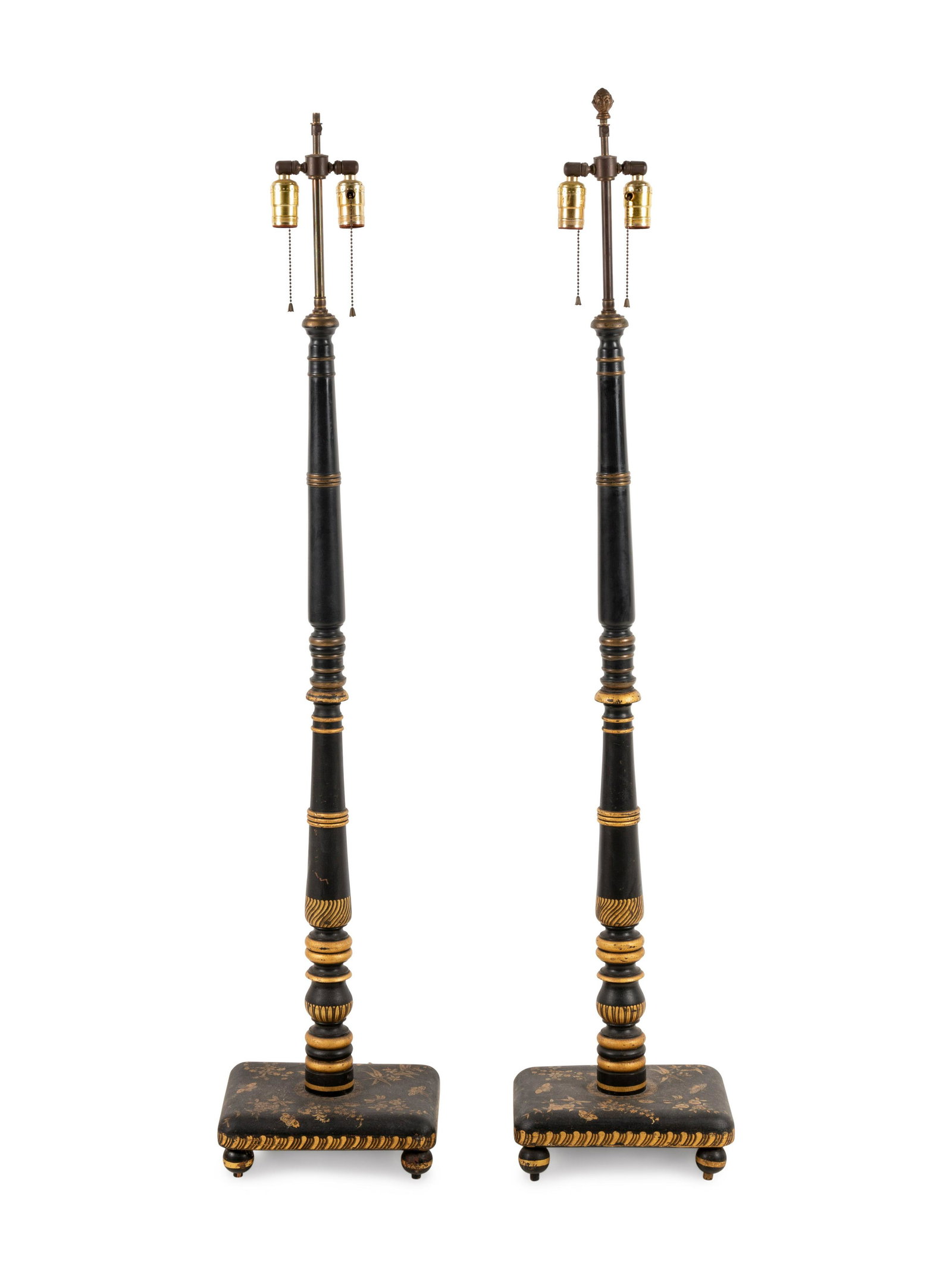 A Pair of Regency Style Parcel Gilt and Ebonized Floor: A Pair of Regency Style Parcel Gilt and Ebonized Floor Lamps Mid-20th Century Height overall 53 1/8 inches. Property from the Collection of James Haft, Winnetka, Illinois