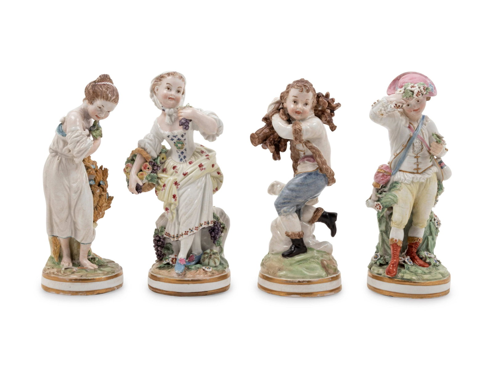 A Set of Four Chelsea Porcelain Four Seasons Figures: A Set of Four Chelsea Porcelain Four Seasons Figures 18th Century each representing one of the four seasons, together with a set of ten Minton Queen's Beasts figures. Height of tallest 8 inches