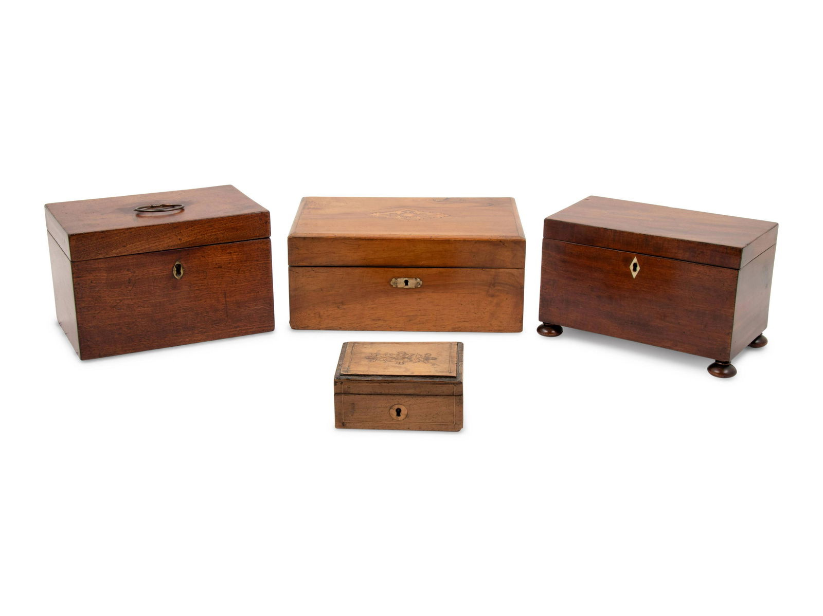 A Group of Three Tea Caddies and a Lap Desk: A Group of Three Tea Caddies and a Lap Desk 19th Century Height of largest 5 x width 11 x depth 7 1/2 inches. 