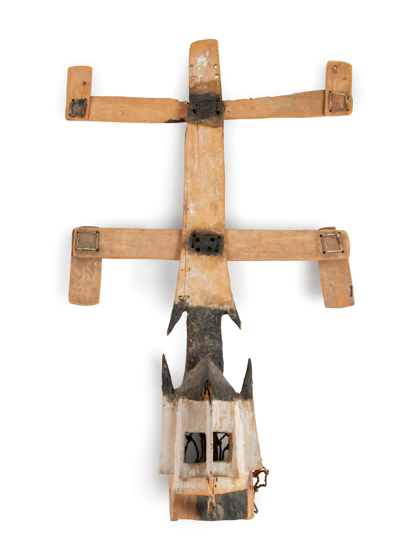 A Dogon Kanaga Mask: A Dogon Kanaga Mask Mali, Mid-20th Century Height 41 x width 26 x depth 7 inches. Property from the Johnson Publishing Company, Chicago, Illinois