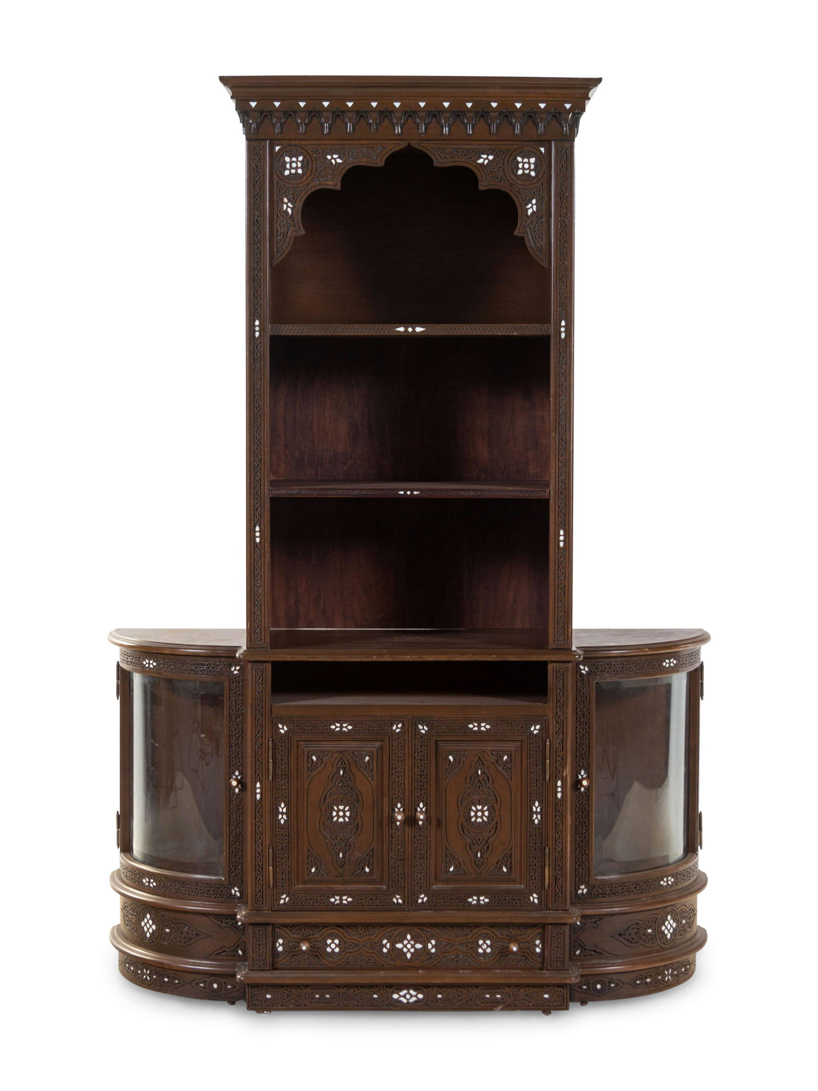 A Syrian Mother-of-Pearl Inlaid and Carved Walnut: A Syrian Mother-of-Pearl Inlaid and Carved Walnut Bookcase 20th Century Height 79 1/2 x width 55 1/4 x depth 18 3/4 inches. Property sold to benefit Karam Foundation, providing education, aid and sust