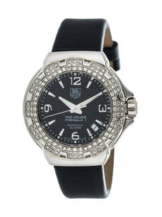 TAG HEUER, STAINLESS STEEL AND DIAMOND 'FORMULA 1': TAG HEUER, STAINLESS STEEL AND DIAMOND 'FORMULA 1' WRISTWATCH 35.00 mm case diameter, the bezel containing 120 round brilliant cut diamonds, black dial, Arabic and baton numerals, center sweep