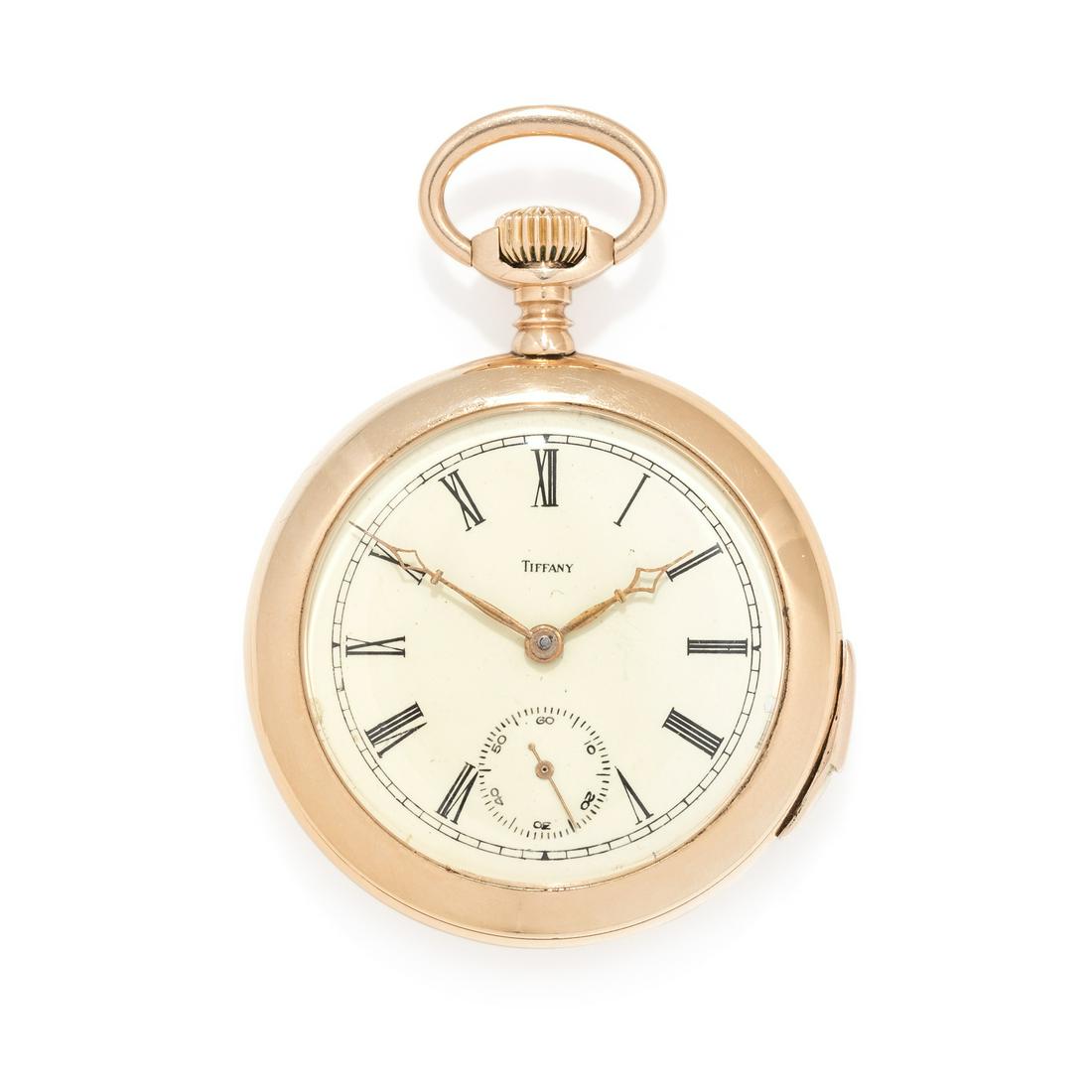 TIFFANY & CO., 14K YELLOW GOLD MINUTE REPEATER OPEN: TIFFANY & CO., 14K YELLOW GOLD MINUTE REPEATER OPEN FACE POCKET WATCH 46.00 mm case diameter, cream dial, black Roman numerals, subdial for seconds at 6 o'clock, stem wound and set jewelled nickel mov