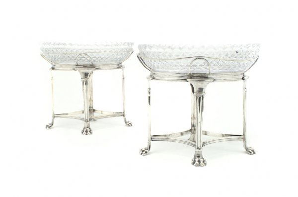 A Pair of American Silver Epergnes, George Gebelei: A Pair of American Silver Epergnes, George Gebelein, circa 1800, Boston, each oval basket holds a cut crystal bowl, raised on four legs joined by a stretcher with paw feet; approximate weight 56.48 oz