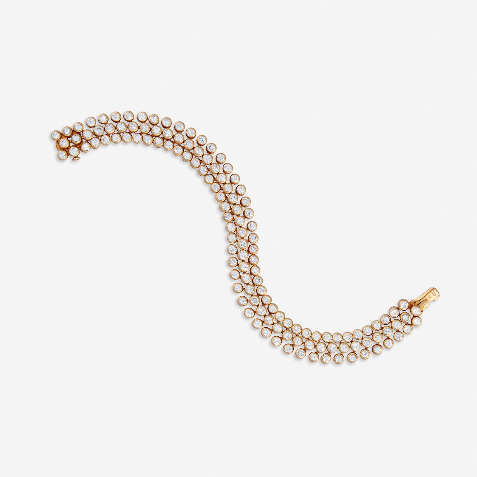 A diamond and eighteen karat gold bracelet, Cartier, (1 of 3)