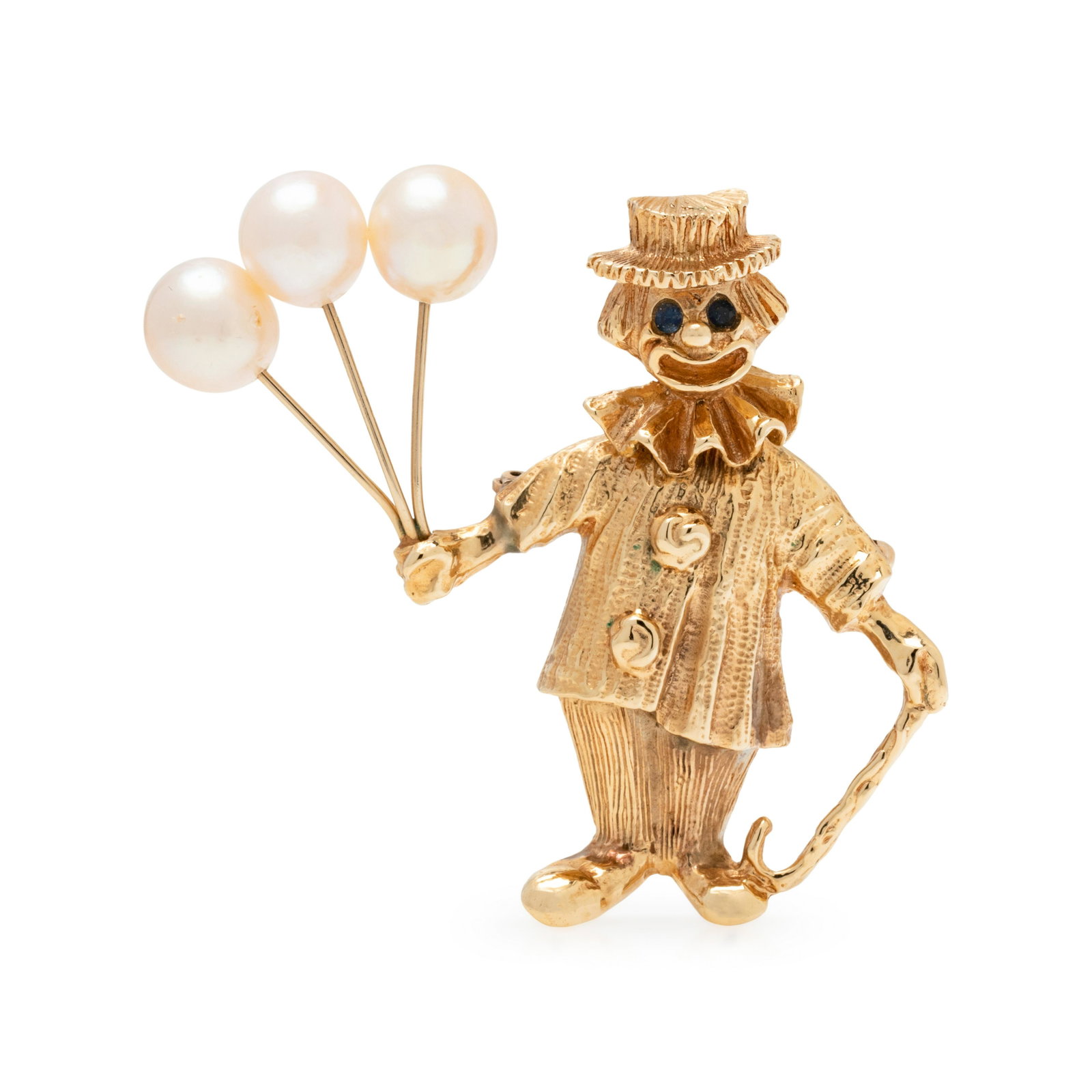 YELLOW GOLD AND CULTURED PEARL CLOWN BROOCH: YELLOW GOLD AND CULTURED PEARL CLOWN BROOCH Consisting of a clown with articulated head with two sapphire eyes, holding balloons consisting of three out of round pearls measuring approximately 8.90 mm