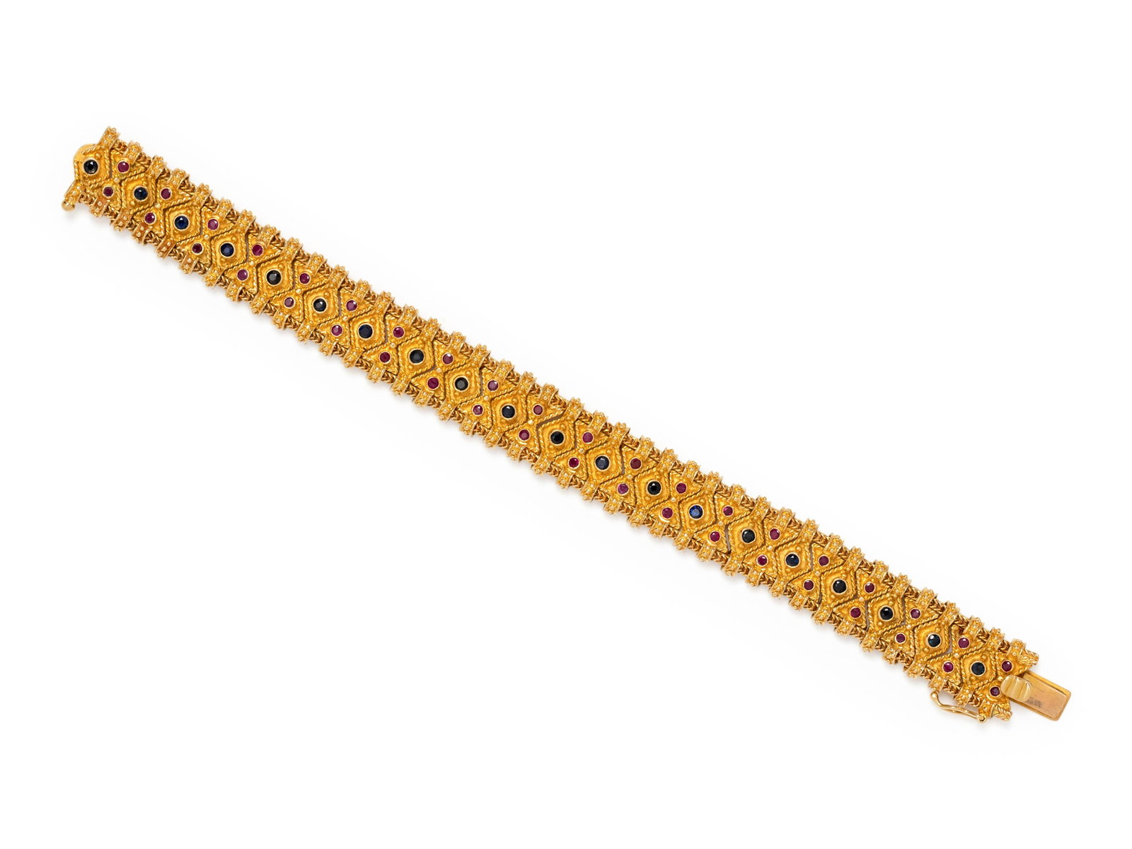 YELLOW GOLD, SAPPHIRE AND RUBY BRACELET: YELLOW GOLD, SAPPHIRE AND RUBY BRACELET Consisting of two foxtail chains strung with connector links containing 20 round mixed cut sapphires and 40 round mixed cut rubies. Stamp: 750. 32.40 dwt. Prope