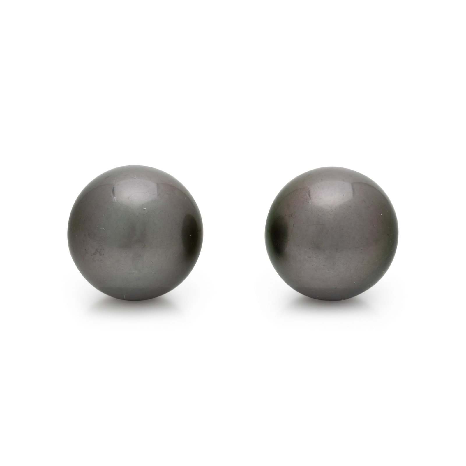 CULTURED TAHITIAN PEARL STUD EARRINGS: CULTURED TAHITIAN PEARL STUD EARRINGS Containing two Tahitian pearls measuring approximately 11.00 mm in diameter. Mounted in white gold. Post stamp: 18K (maker's mark). 3.05 dwt.