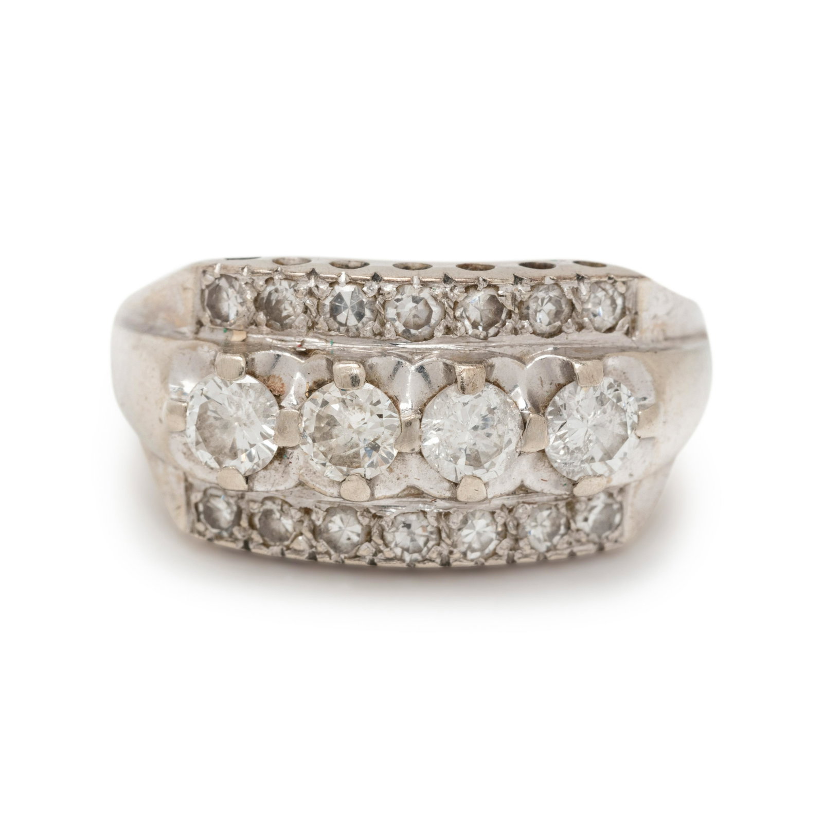 DIAMOND RING: DIAMOND RING Containing four round brilliant cut diamonds weighing approximately 0.60 carat total and 14 single cut diamonds. Mounted in white gold. Stamp: G. 3.00 dwt.