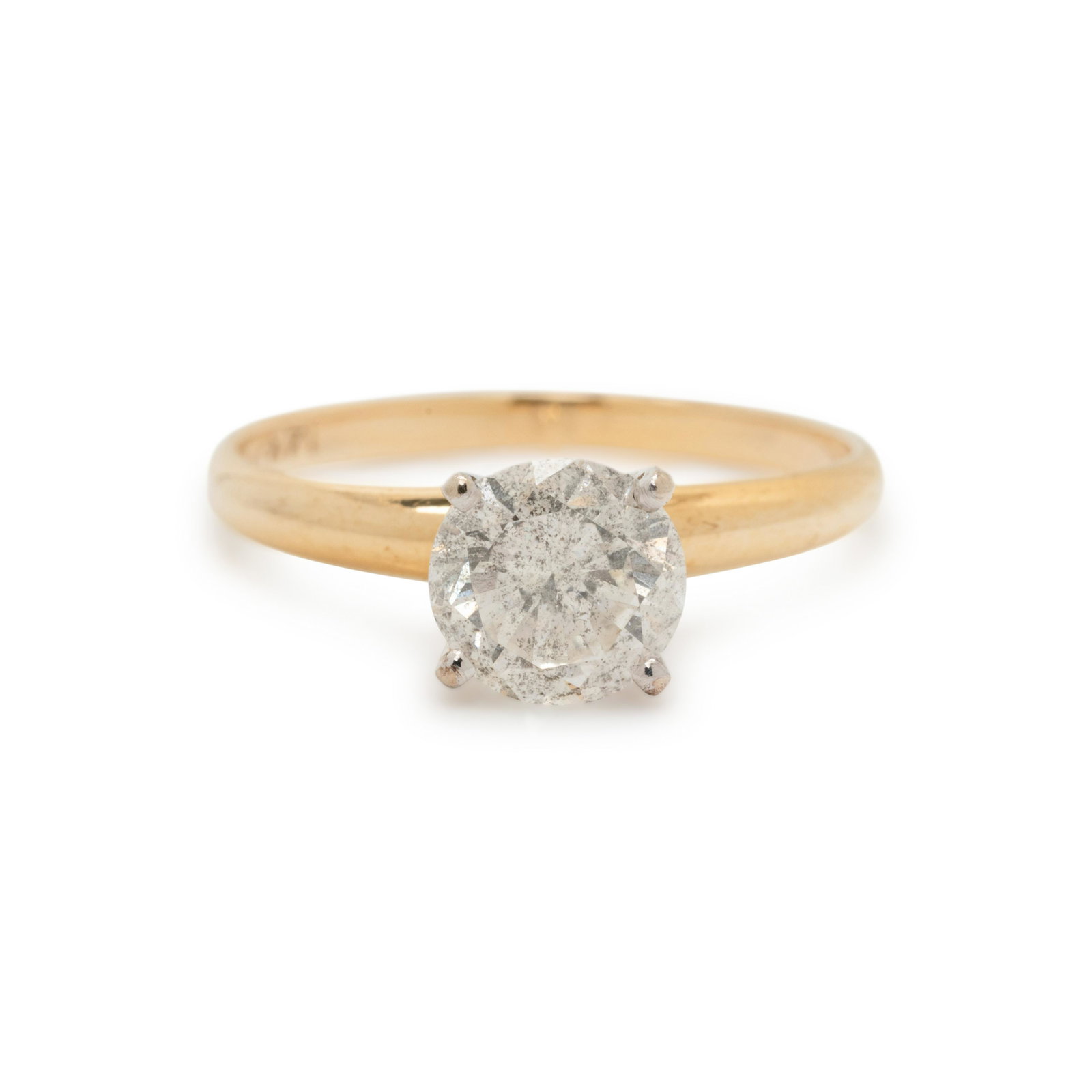DIAMOND RING: DIAMOND RING Containing one round brilliant cut diamond weighing approximately 1.15 carats. Mounted in bicolor gold. Stamp: 14K. 1.25 dwt. From The Estate of Cathy D. Perry, Ocala, Florida