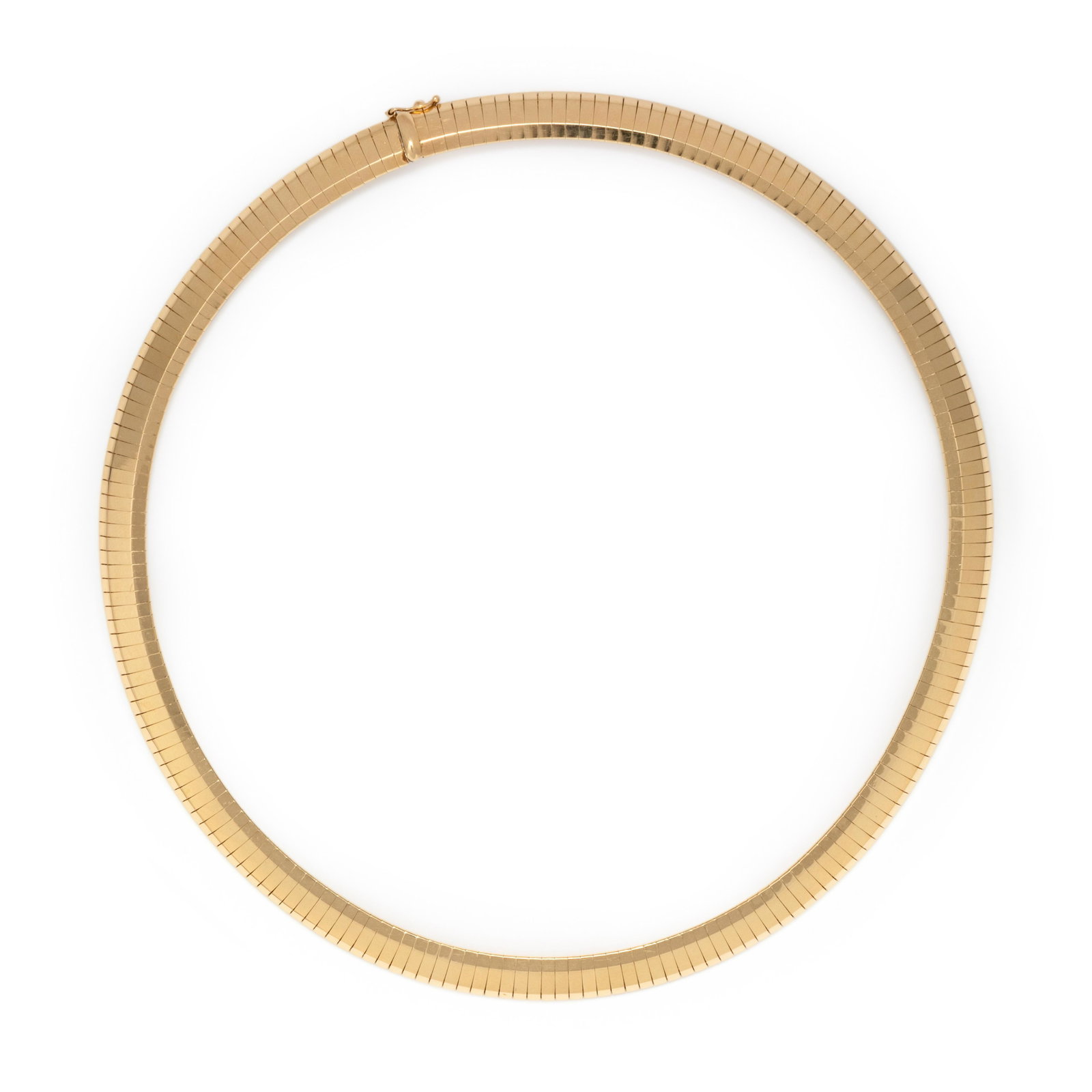 YELLOW GOLD NECKLACE: YELLOW GOLD NECKLACE Consisting of an omega chain measuring approximately 8.00 mm wide. Stamp: 14KT ITALY MILROS. 23.60 dwt.