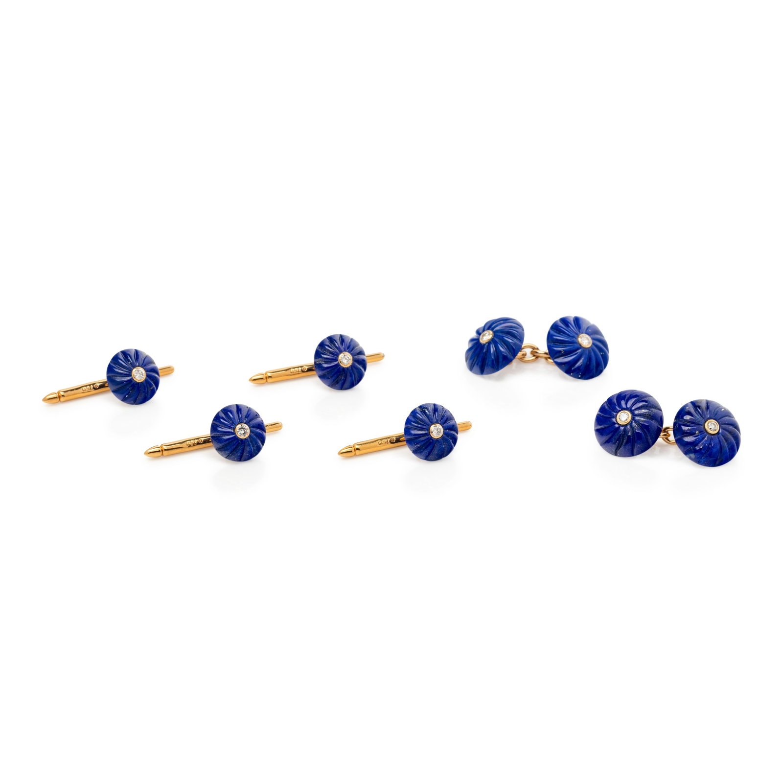 TRIANON, LAPIS LAZULI AND DIAMOND DRESS SET: TRIANON, LAPIS LAZULI AND DIAMOND DRESS SET Consisting of a pair of cufflinks containing four round carved lapis lazuli surmounted with four round brilliant cut diamonds, together with four shirt stud