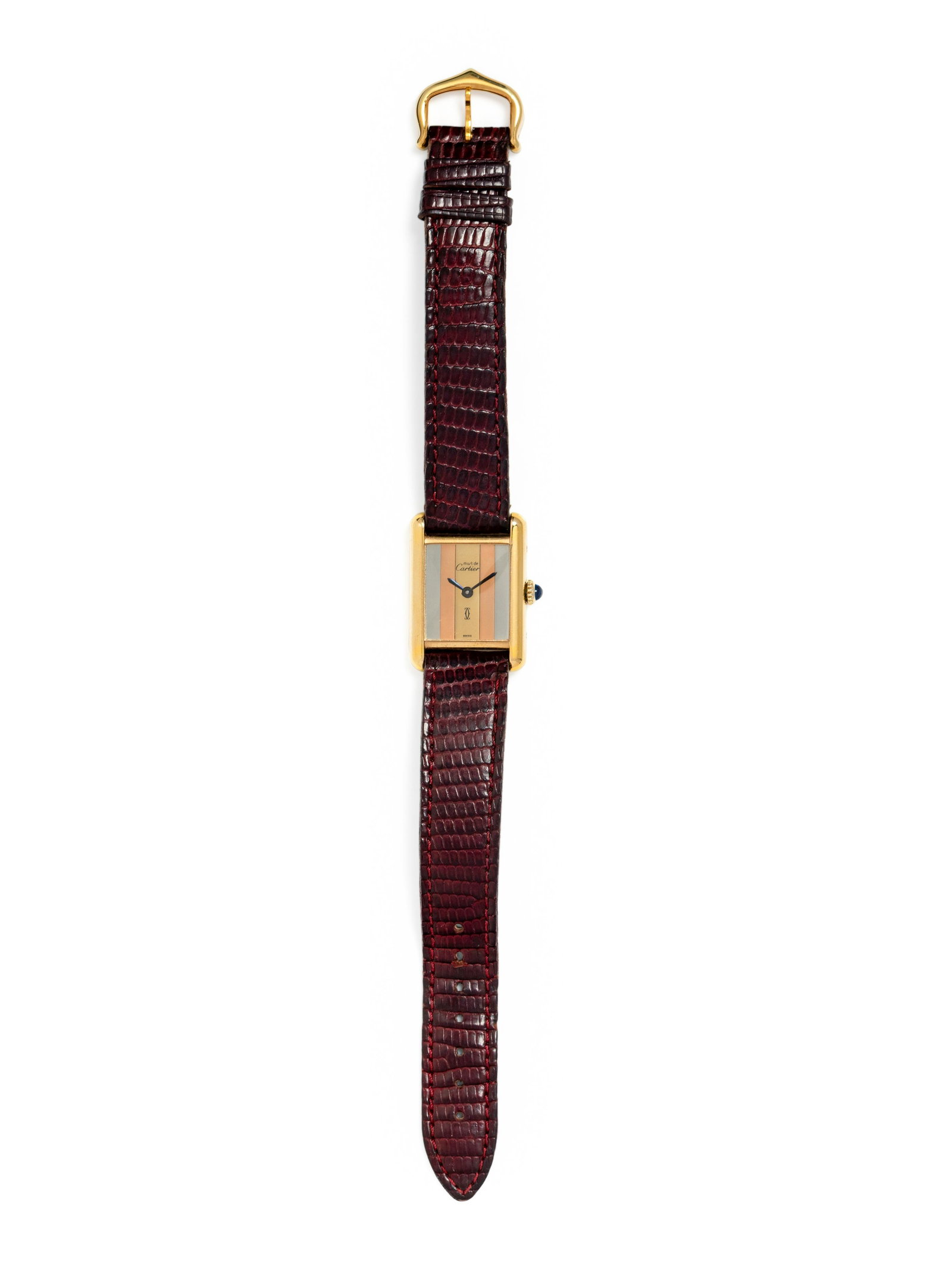 CARTIER, GOLD VERMEIL 'MUST DE CARTIER' WRISTWATCH: CARTIER, GOLD VERMEIL 'MUST DE CARTIER' WRISTWATCH 27.00 x 20.00 mm case dimensions inclusive of lugs, tricolor dial with silver and yellow and rose gold vermeil, manual wind movement, maroon leather 