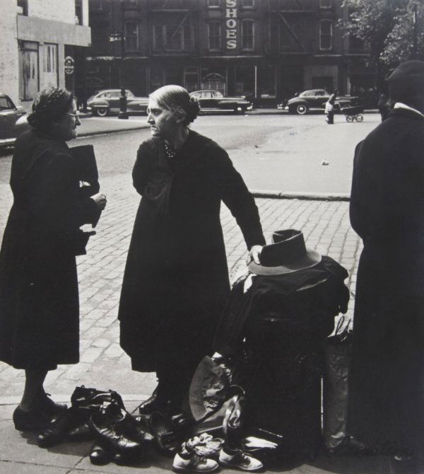 Lou Bernstein, (American, 1911-2005), Hester Street, 19: Lou Bernstein (American, 1911-2005) Hester Street, 1942 gelatin silver print signed (on the image, lower right), stamped, signed, titled and dated (on the reverse mount) 8 1/16 x 7 3/8 inches.