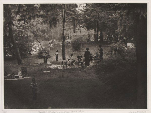 Roy DeCarava, (American, b. 1919), Fourth of July, Pros: Roy DeCarava (American, b. 1919) Fourth of July, Prospect Park, 1979 photogravure signed, titled and dated (in the margin) 8 x 11 inches.