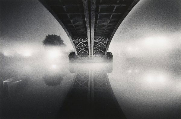Michael Kenna, (British/American, b. 1953), River Thame: Michael Kenna (British/American, b. 1953) River Thames, London, England, 1983 (Homage to Brassa•) sepia and selenium toned gelatin silver print #137, stamped (on the verso) 5 1/2 x 8 1/4 inches.