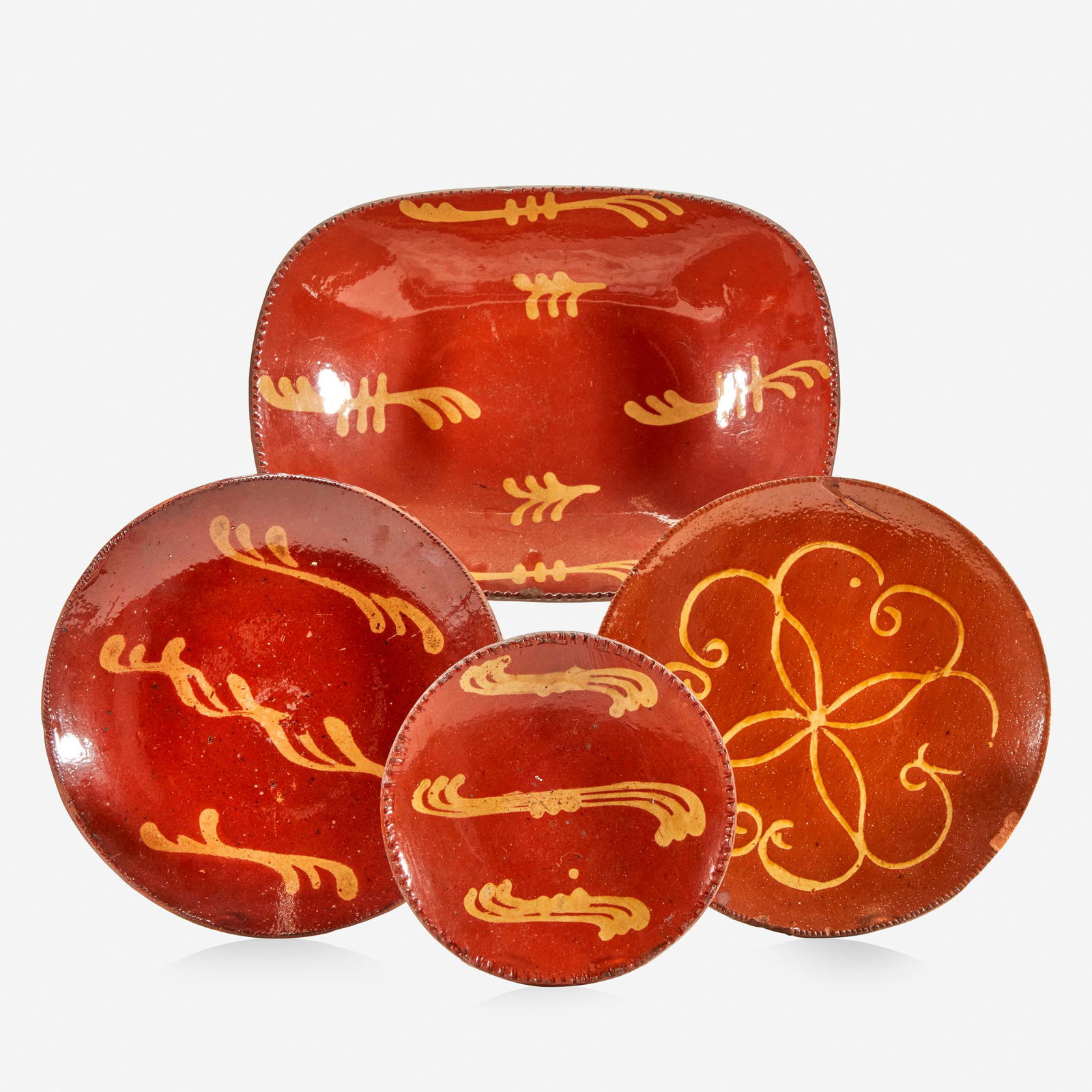 A glazed and slip-decorated redware loaf dish and three (1 of 1)