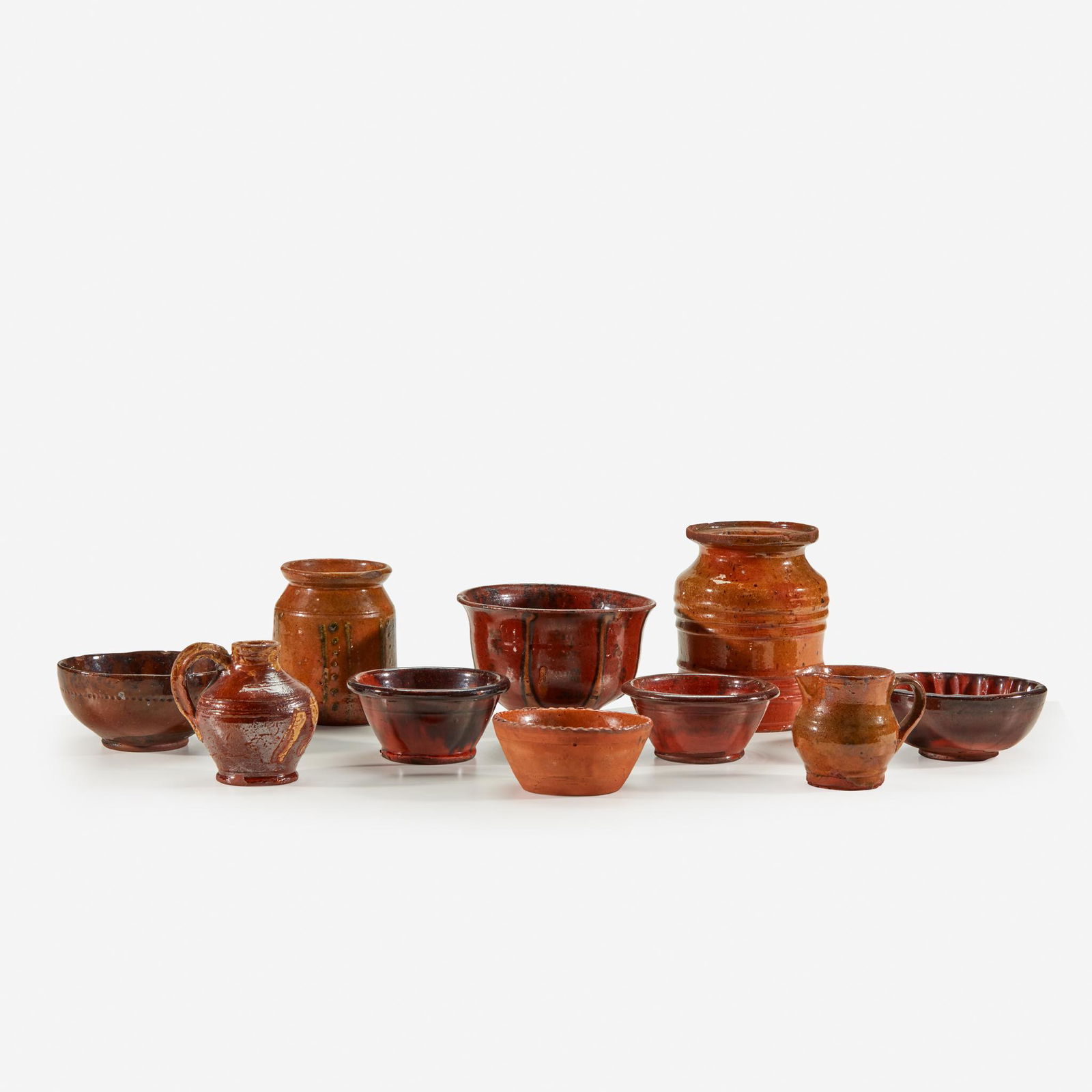 A group of assorted small glazed redware items, (1 of 1)