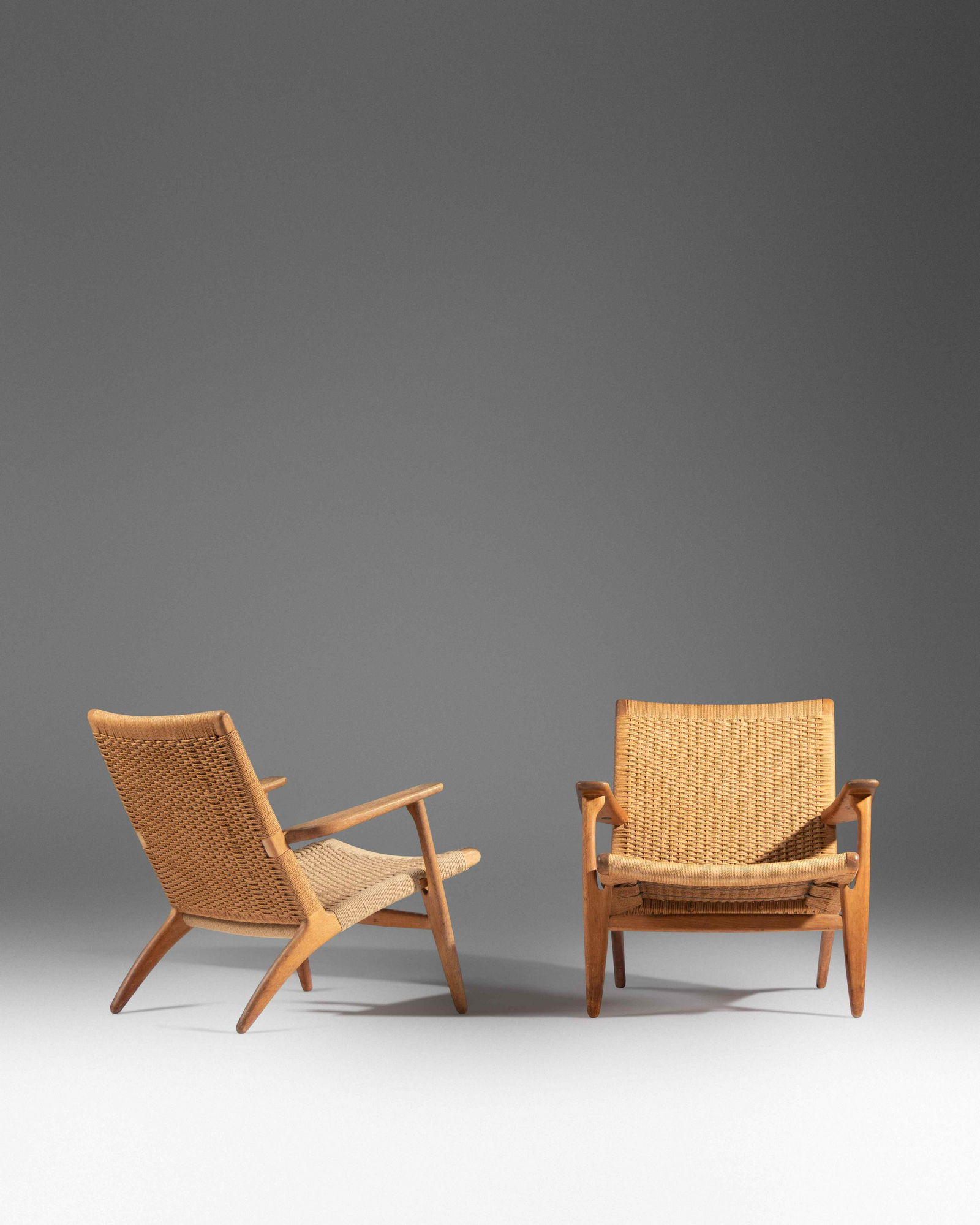 Hans J. Wegner (Danish, 1914-2007) A Pair of CH-25 (1 of 8)