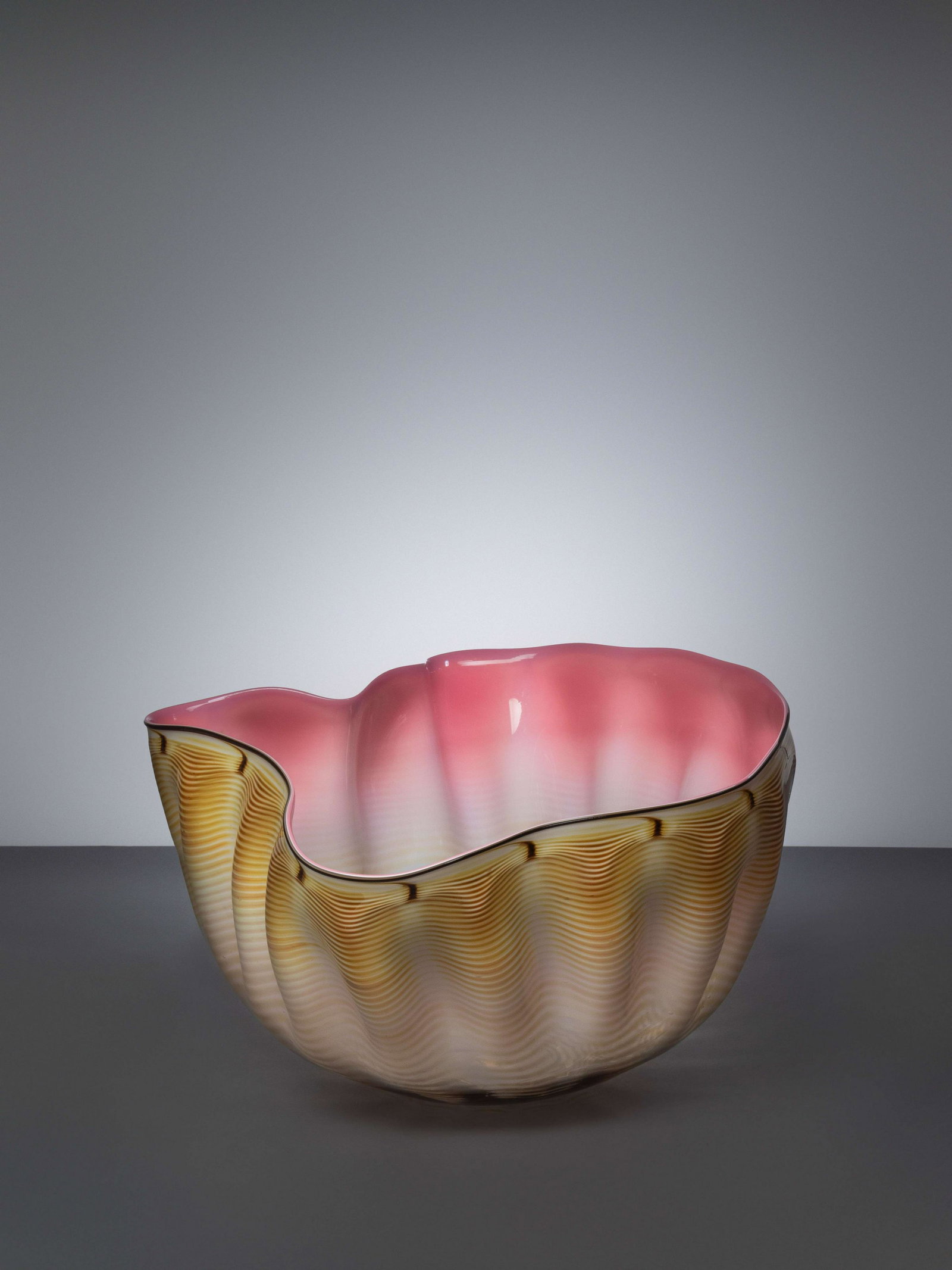 Dale Chihuly (American, b. 1941) Pink and Gold Seaform,: Dale Chihuly (American, b. 1941) Pink and Gold Seaform, c. 1984 blown glass etched signature 'Chihuly 1994' to underside H 8 x W 14 1/2 x D 14 1/4 inches