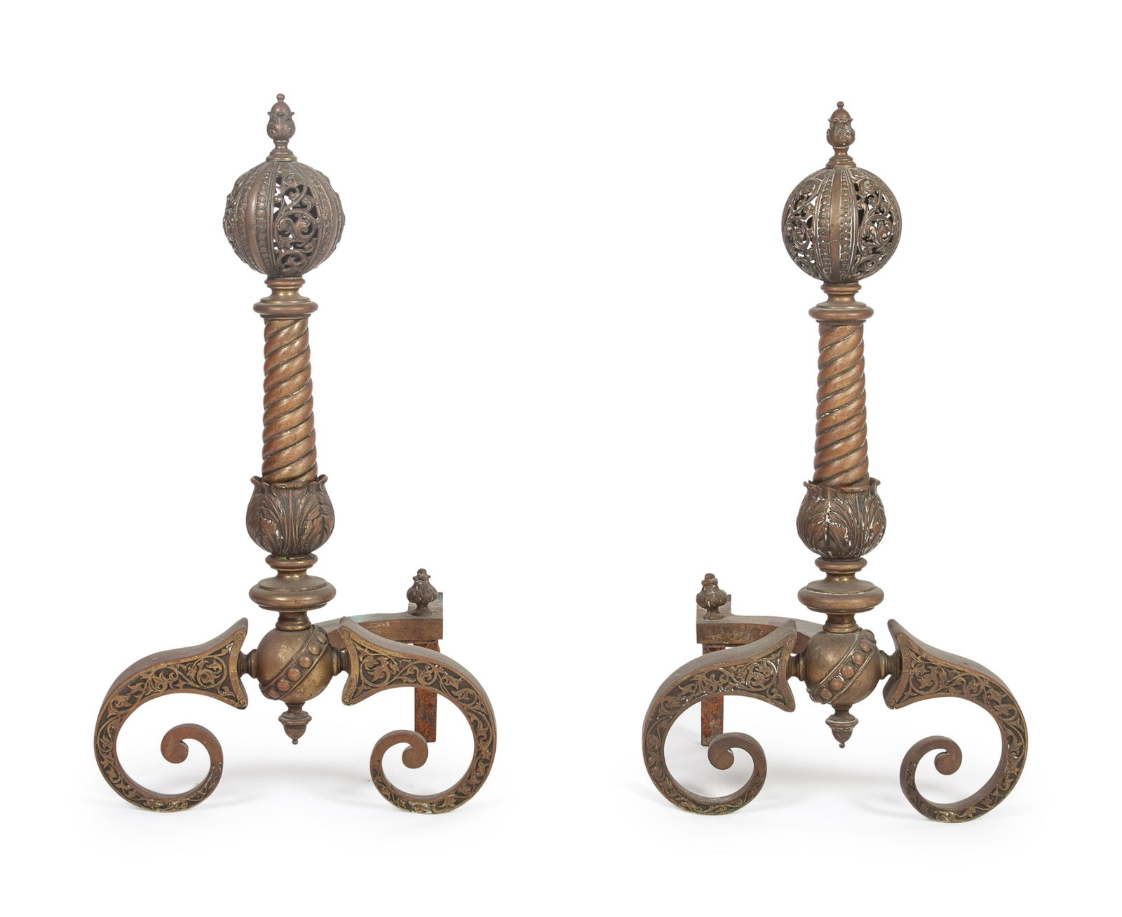 A Pair of Brass Andirons: A Pair of Brass Andirons each with pierced finial, raised on scroll feet. Height 25 3/4 inches.